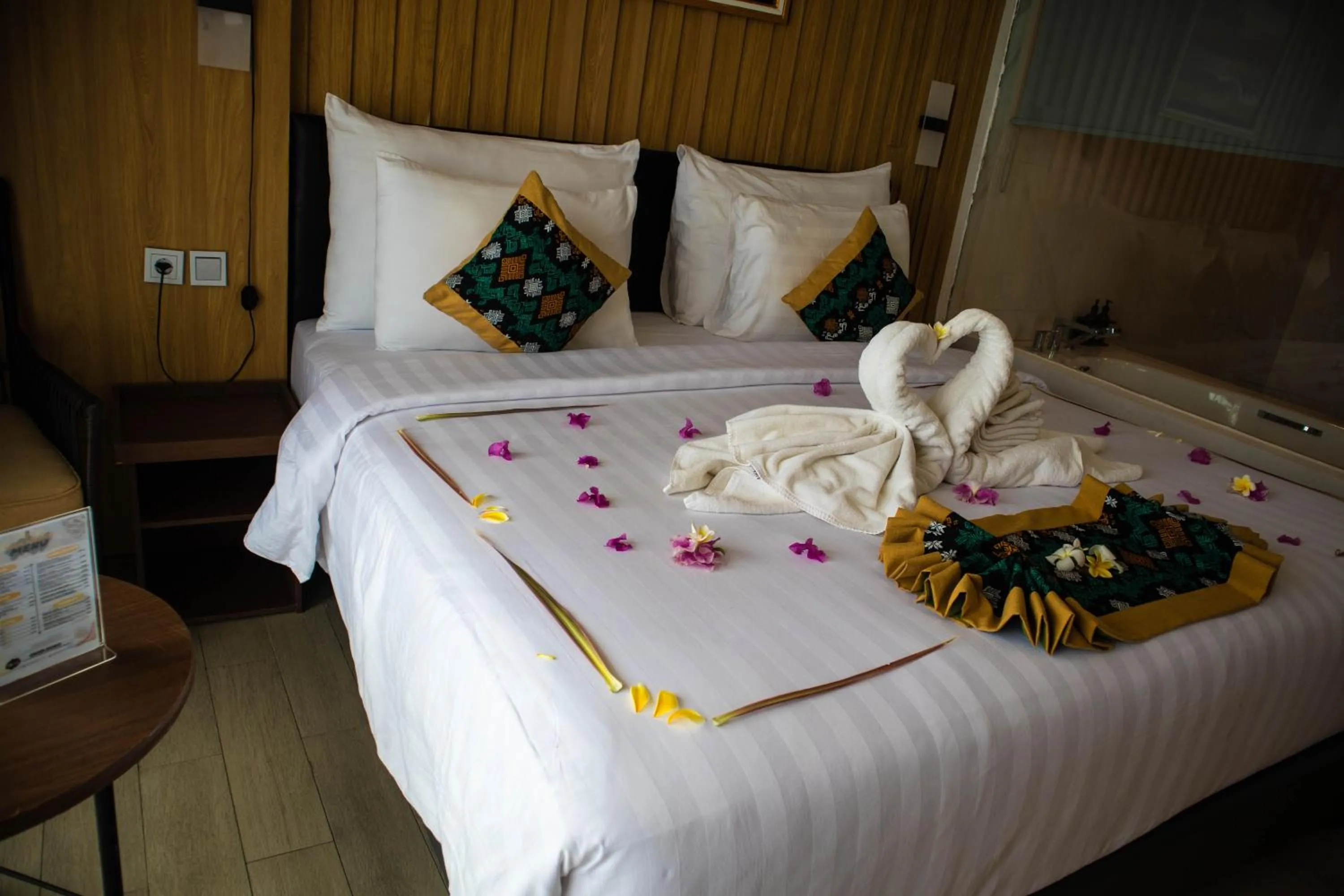 Bed in Raja Hotel Kuta Mandalika Resort & Convention