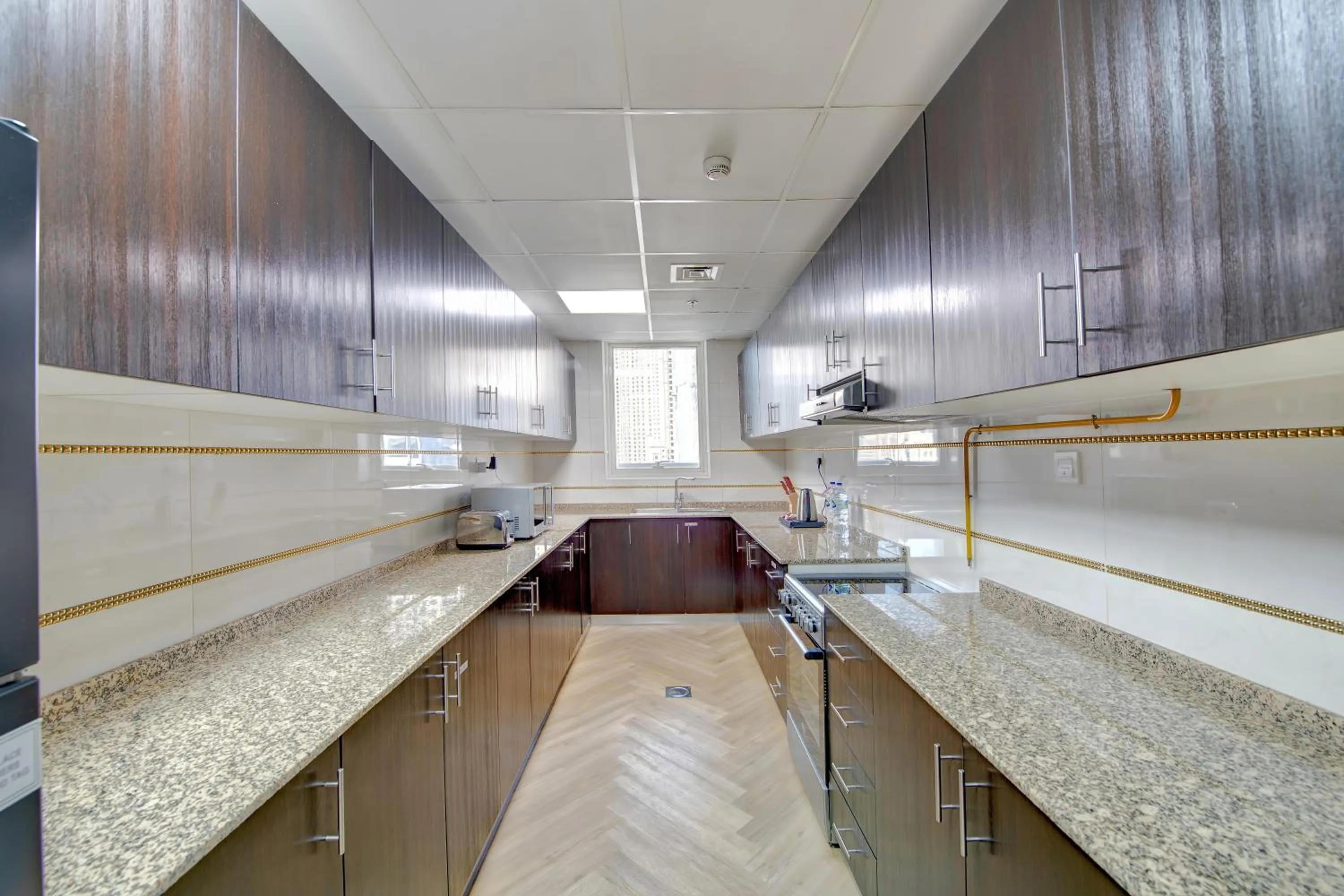 Kitchen or kitchenette in Royal Regency Suites Marina