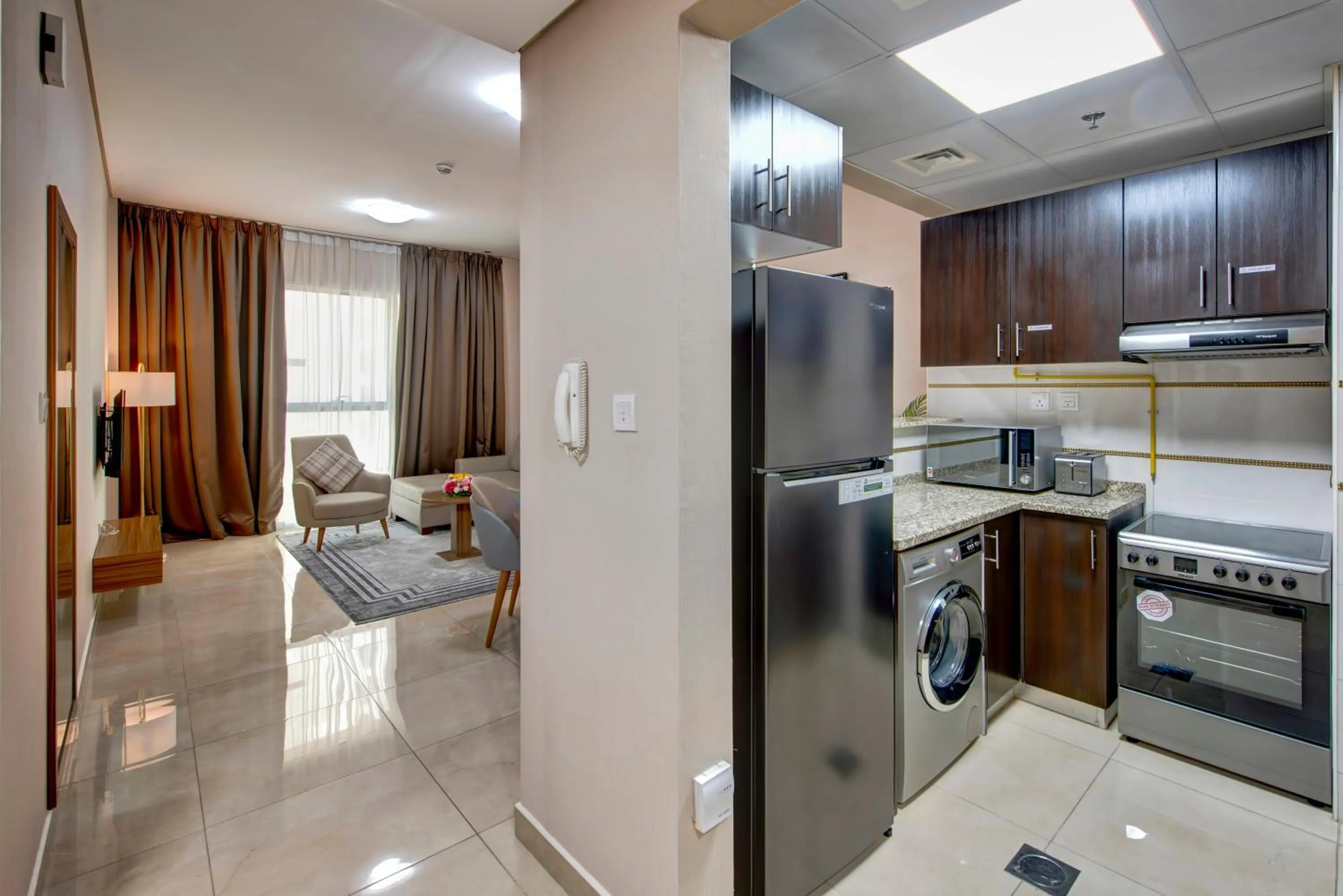 Kitchen or kitchenette in Royal Regency Suites Marina