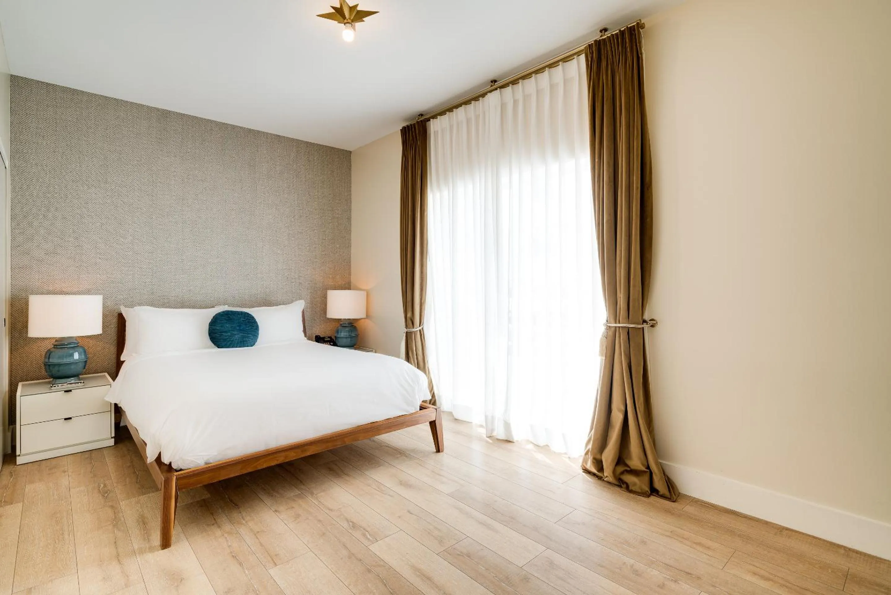 Bed in The Savoy Hotel & Beach Club