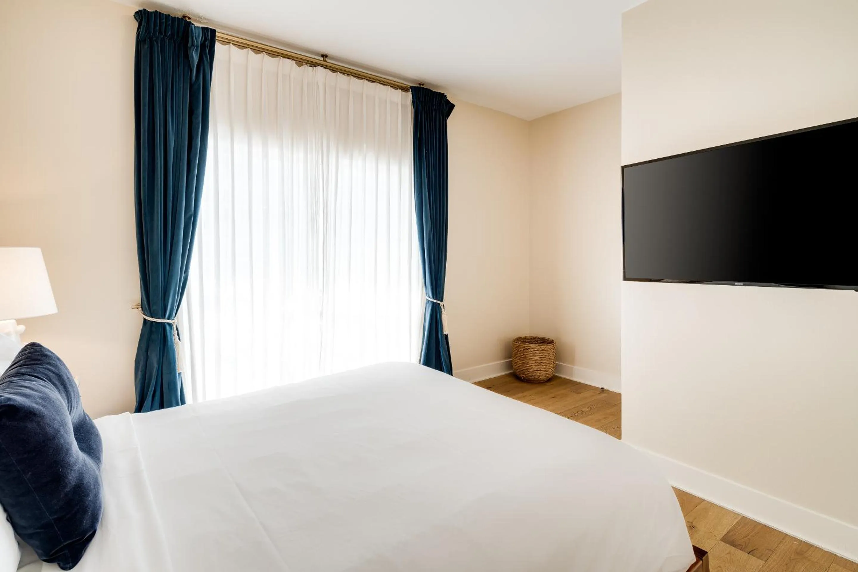 Bed in The Savoy Hotel & Beach Club