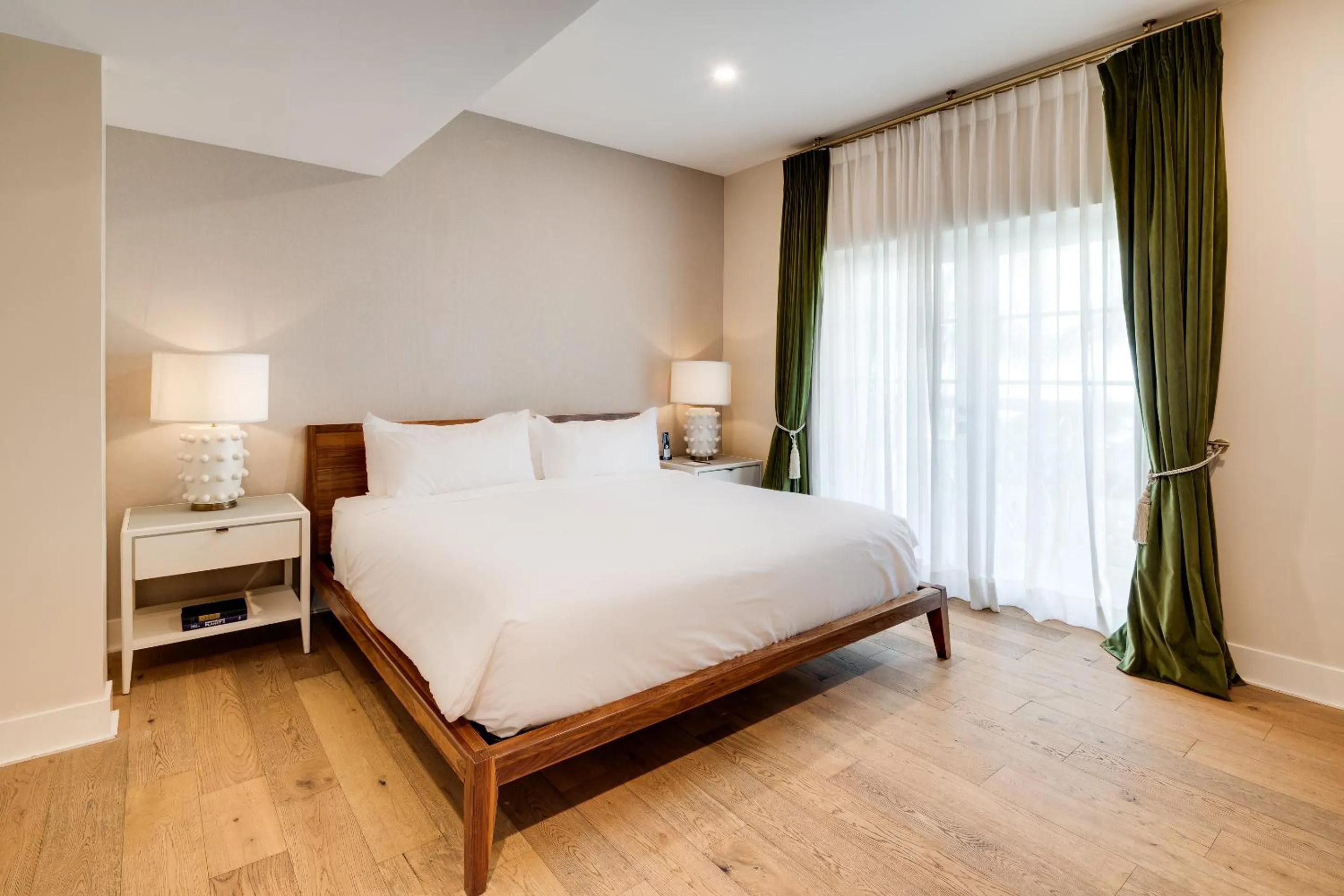 Bed in The Savoy Hotel & Beach Club