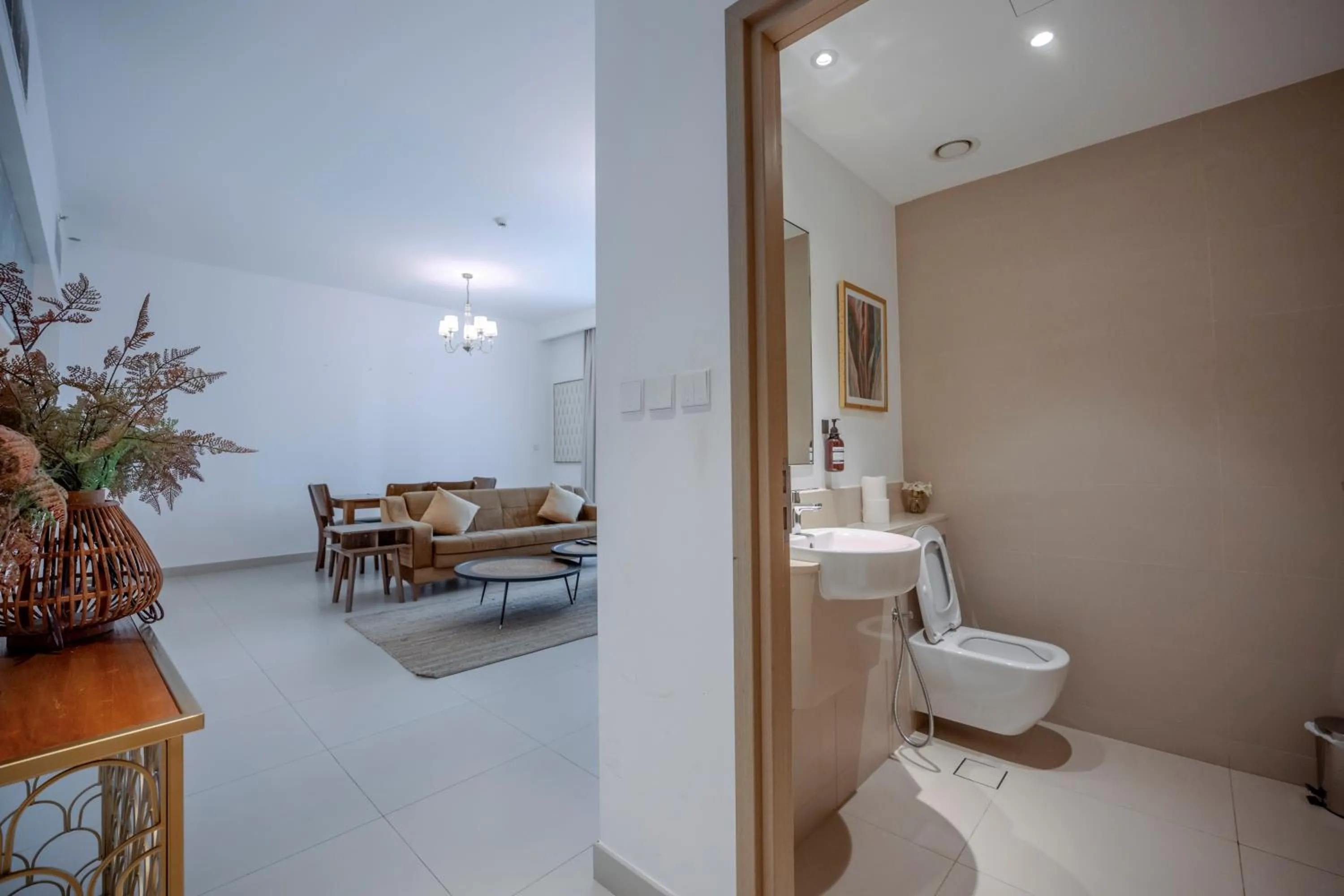 Toilet in 3BR Haven with Burj Views by MagnoliasVHR