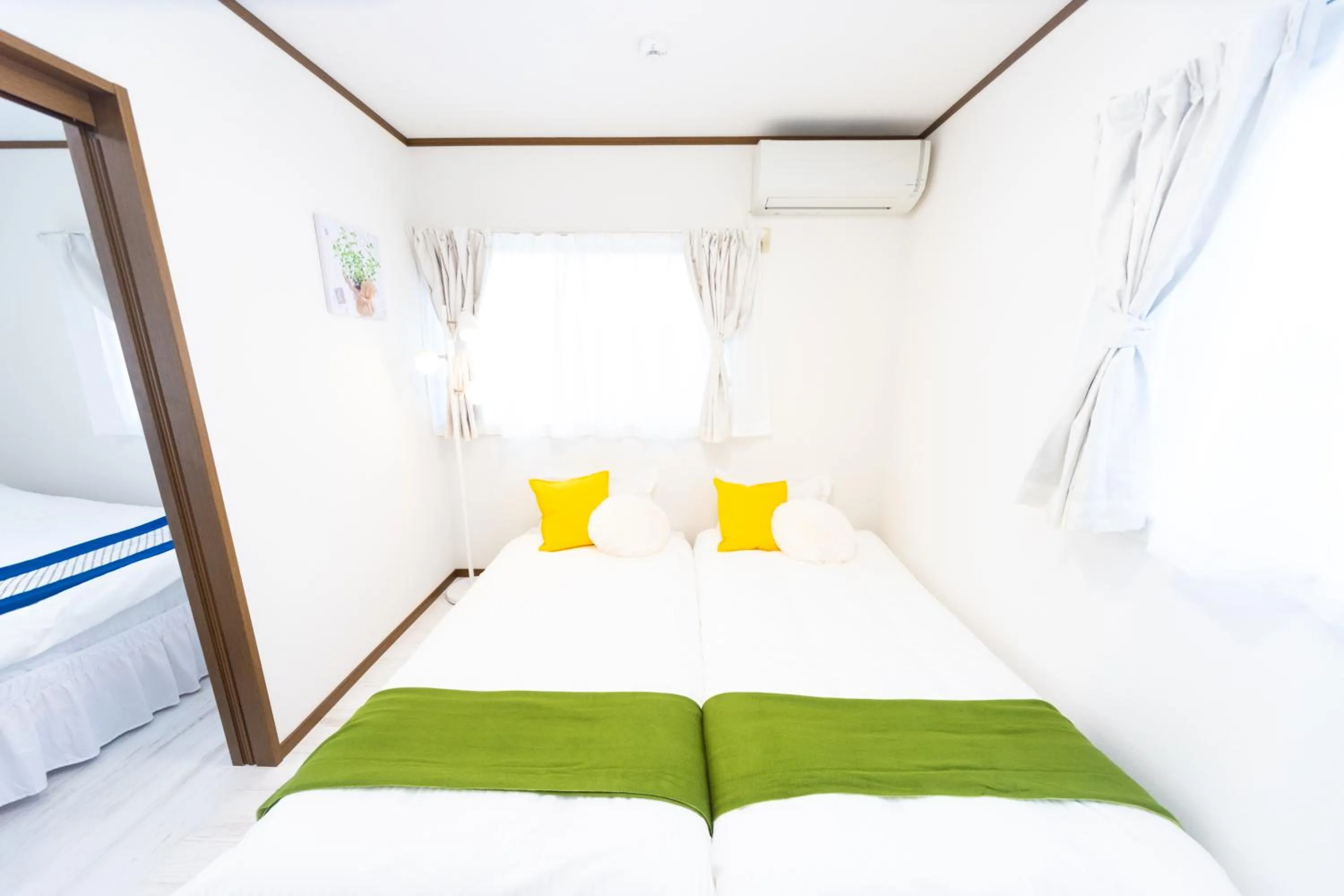 Bed in Awaji Garden House in Shinmura