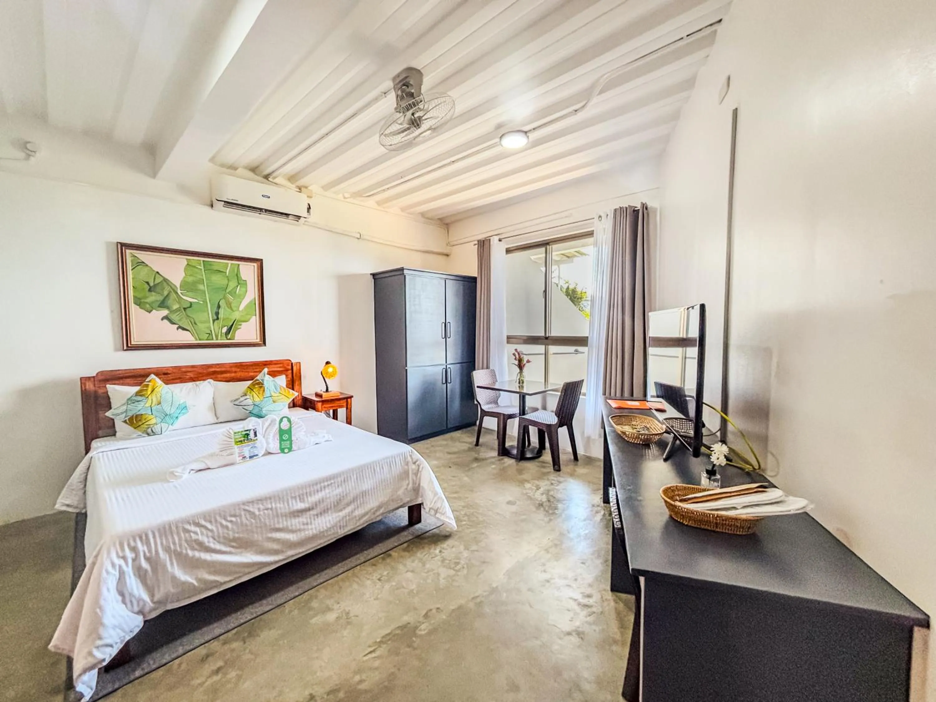 Photo of the whole room, Bed in AV Suites