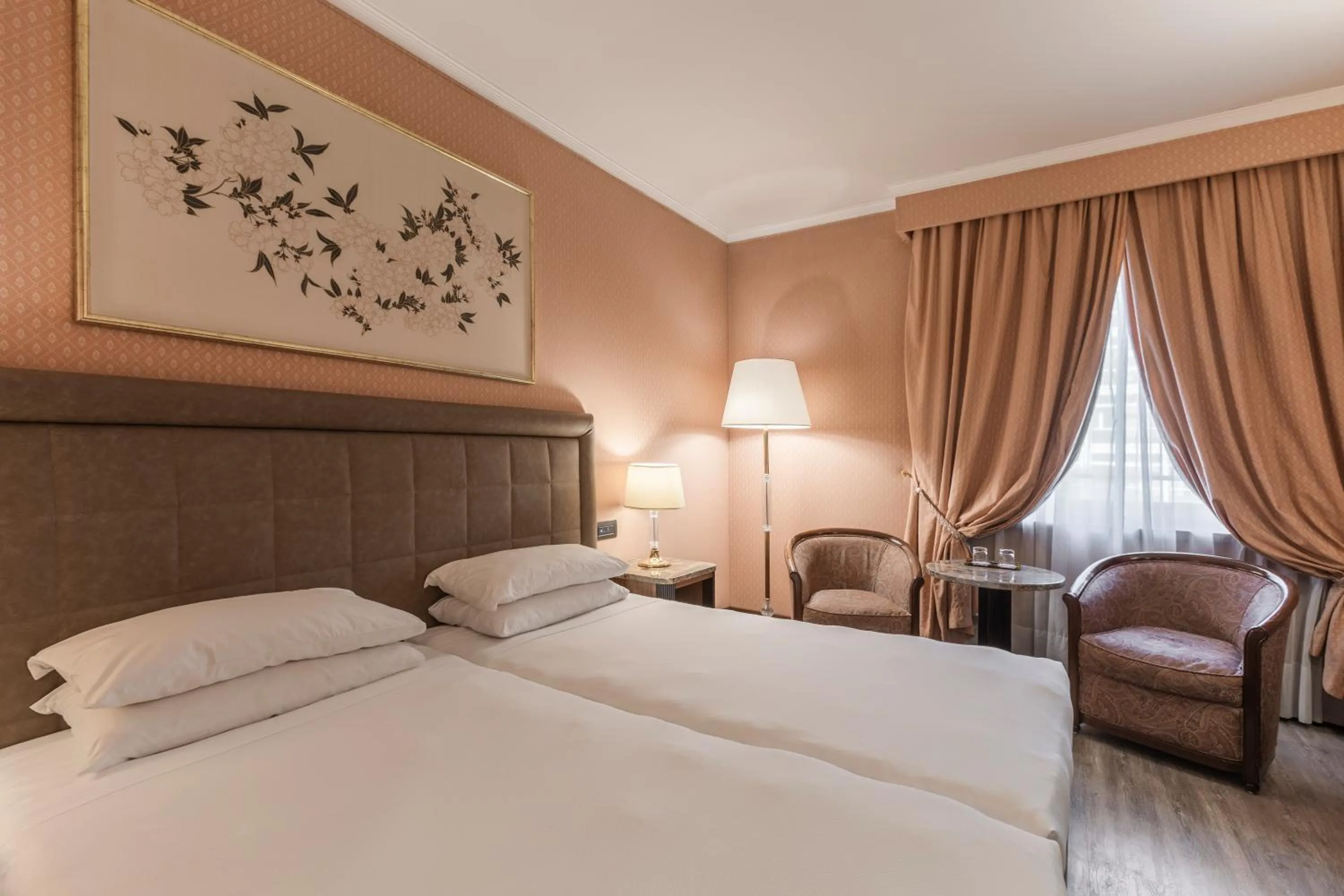 Bed in Doria Grand Hotel