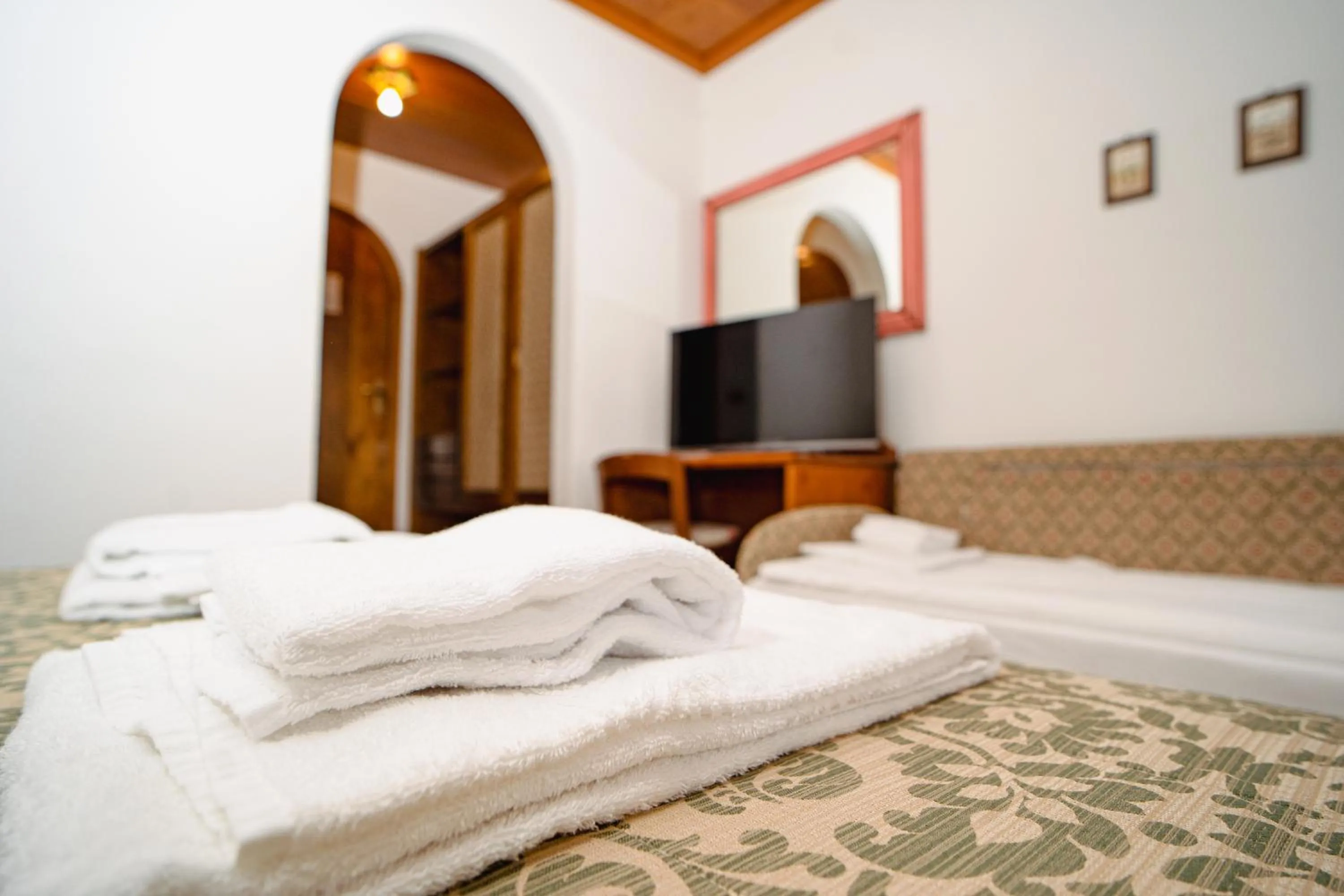 towels, Bed in Hotel Sporting