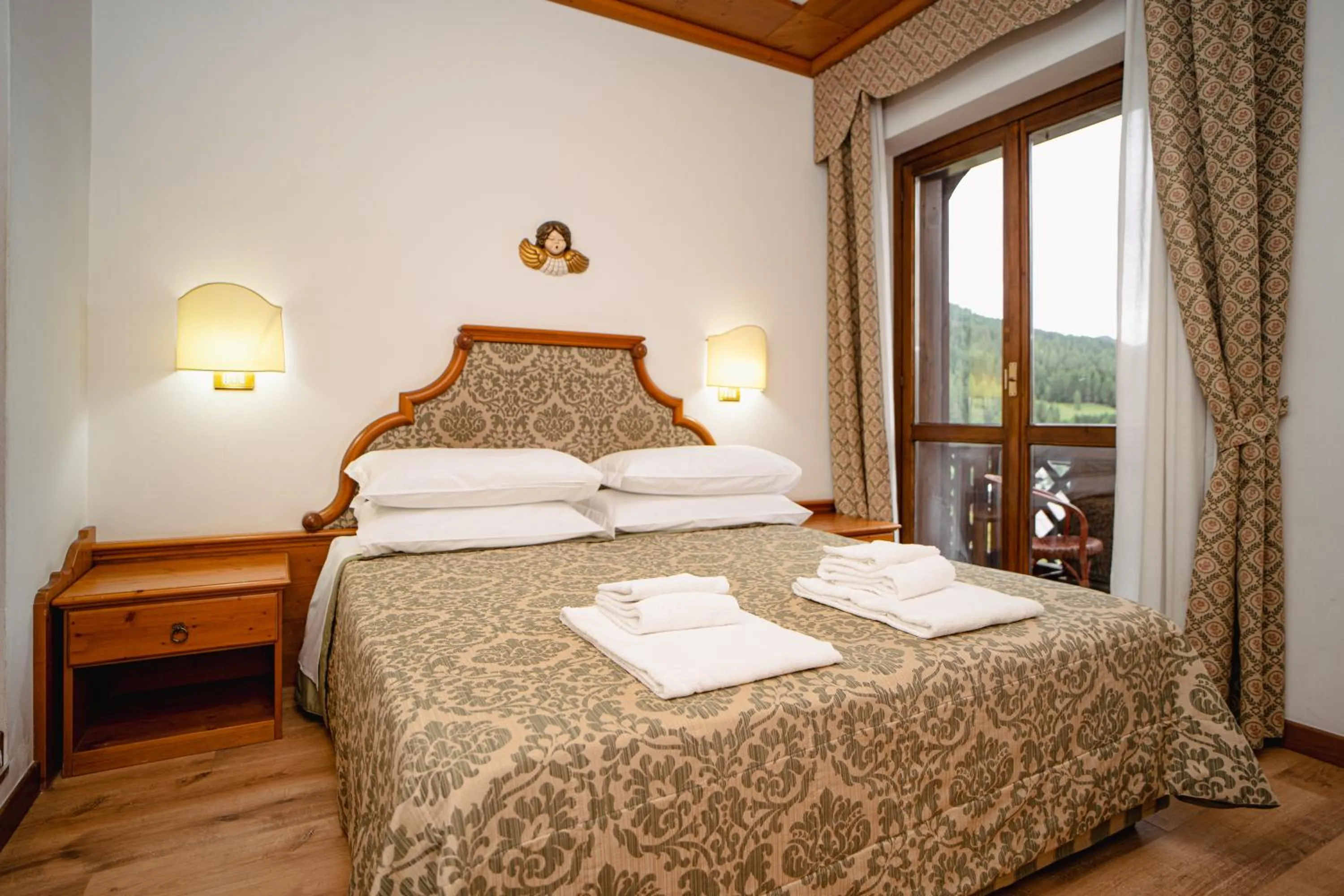 towels, Bed in Hotel Sporting