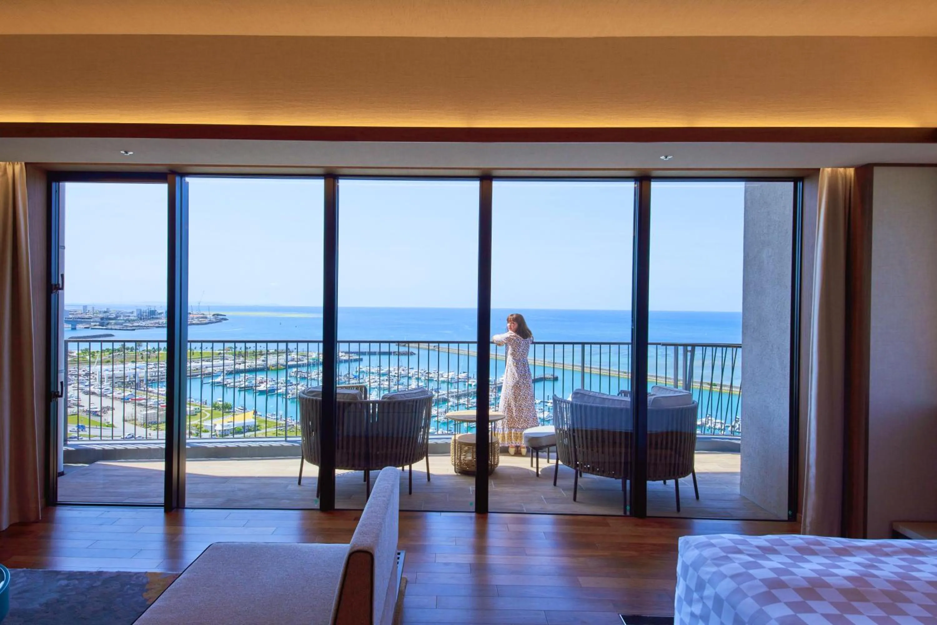 Balcony/Terrace, Bed in Okinawa Prince Hotel Ocean View Ginowan