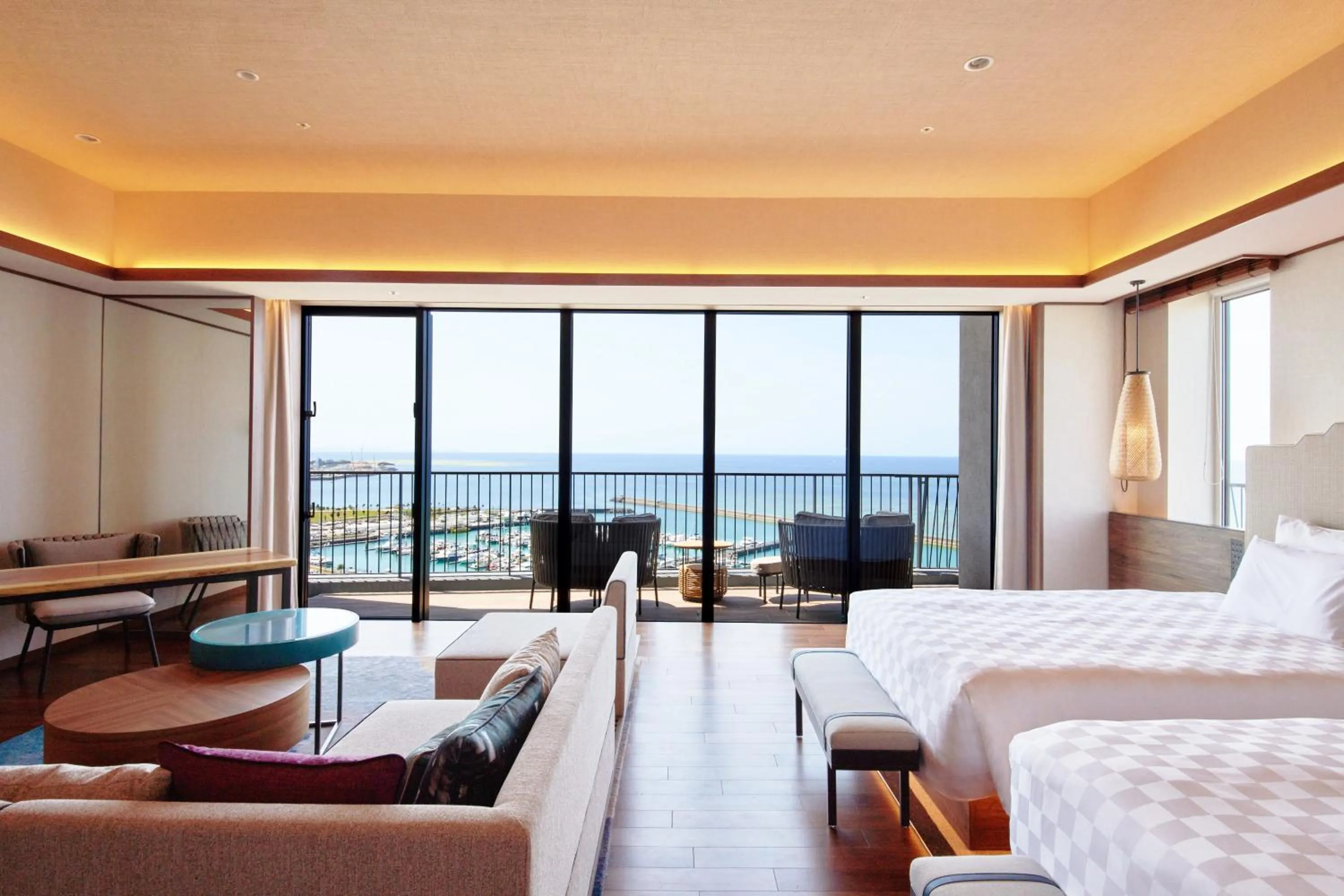 Balcony/Terrace, Bed in Okinawa Prince Hotel Ocean View Ginowan