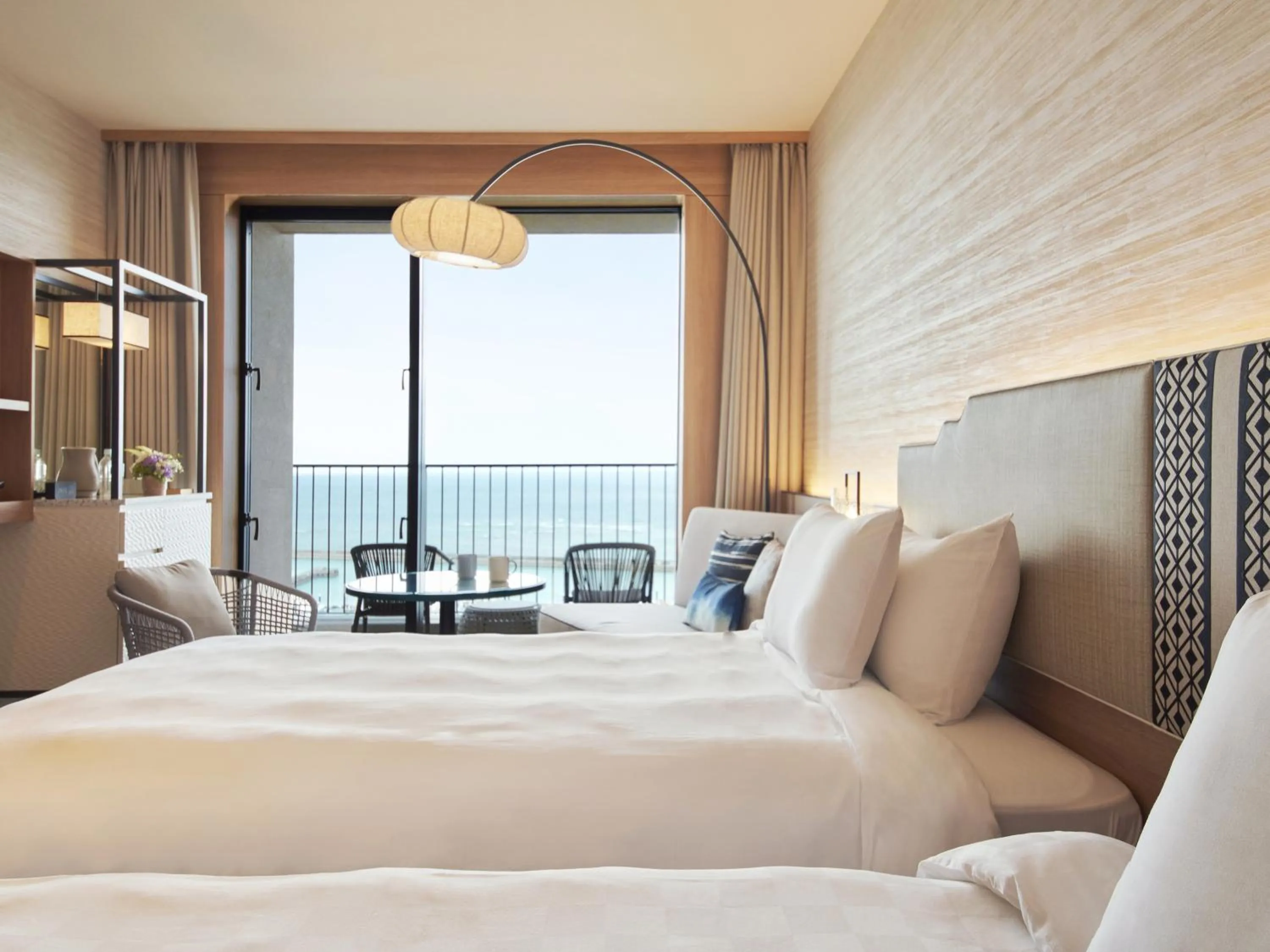 Balcony/Terrace, Bed in Okinawa Prince Hotel Ocean View Ginowan