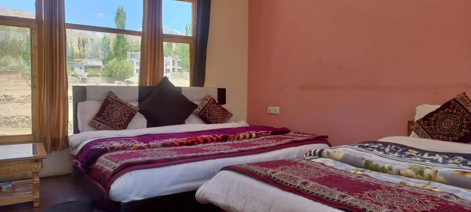 Bed in Hotel Malik Residency