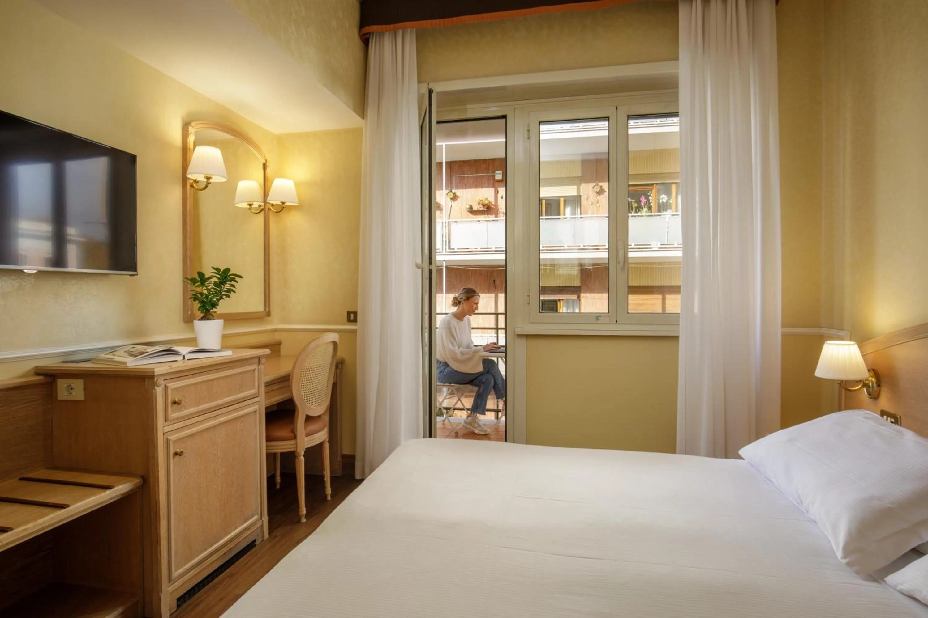 Bed in Hotel Santa Costanza by OMNIA hotels