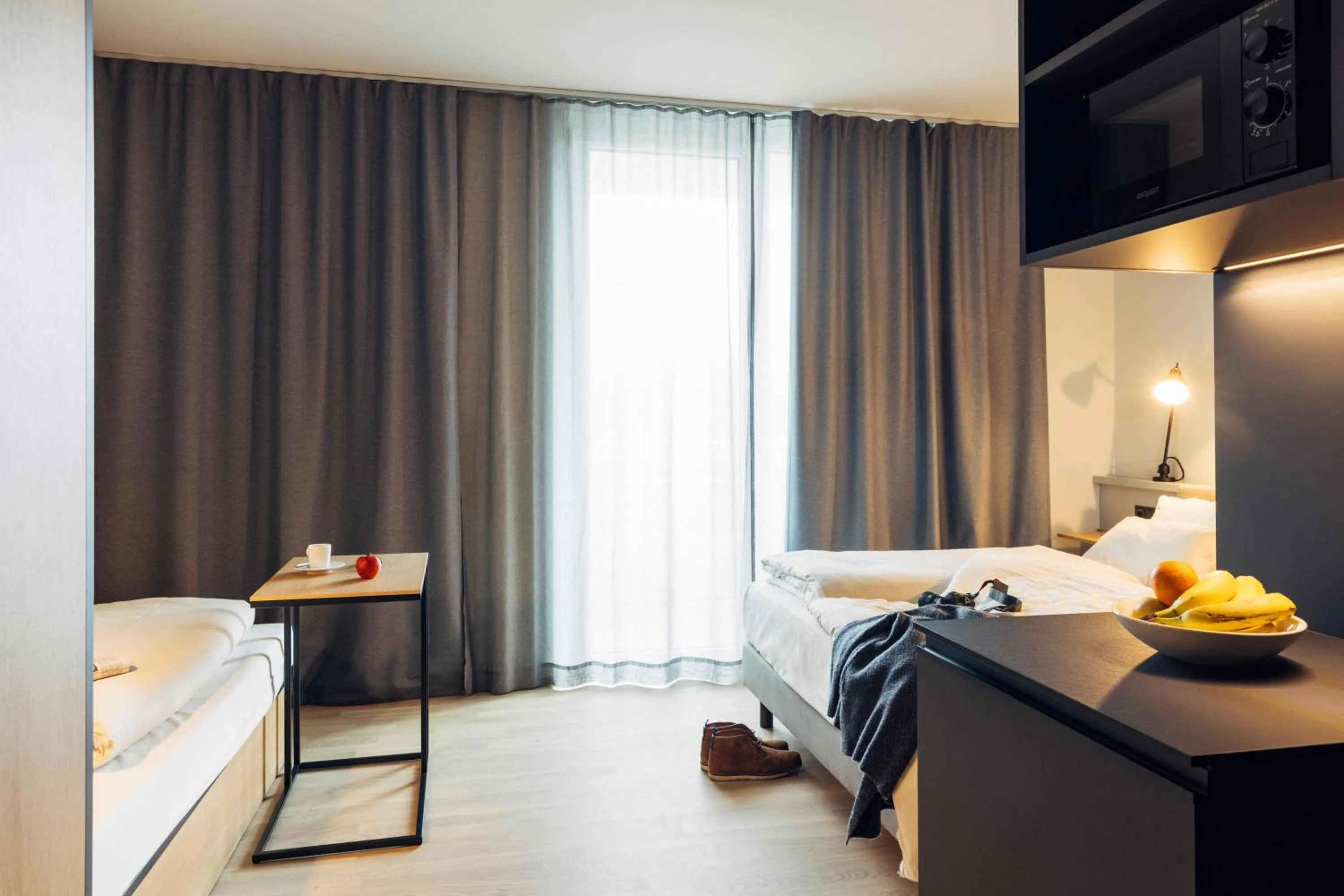 Photo of the whole room, Bed in harry's home Telfs hotel & apartments