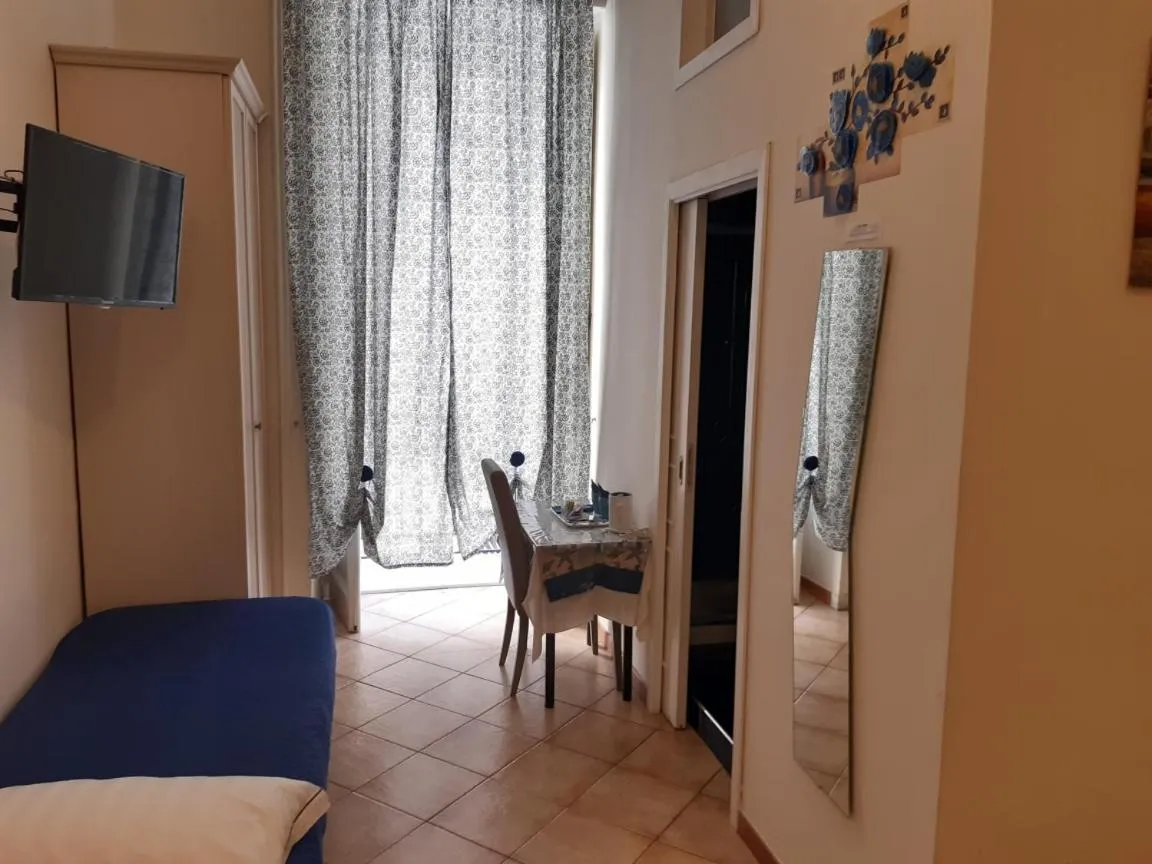 Bedroom in Relais Napoli Velata