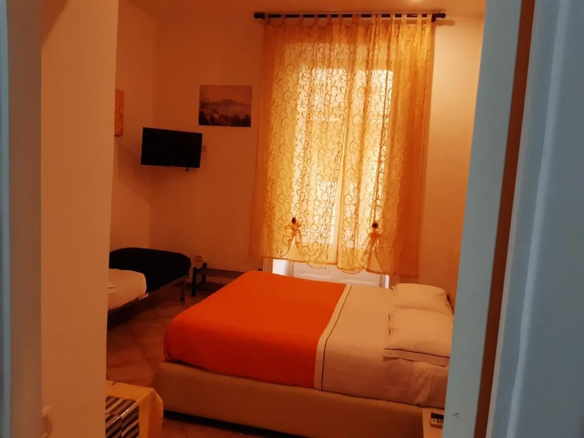 Bedroom in Relais Napoli Velata