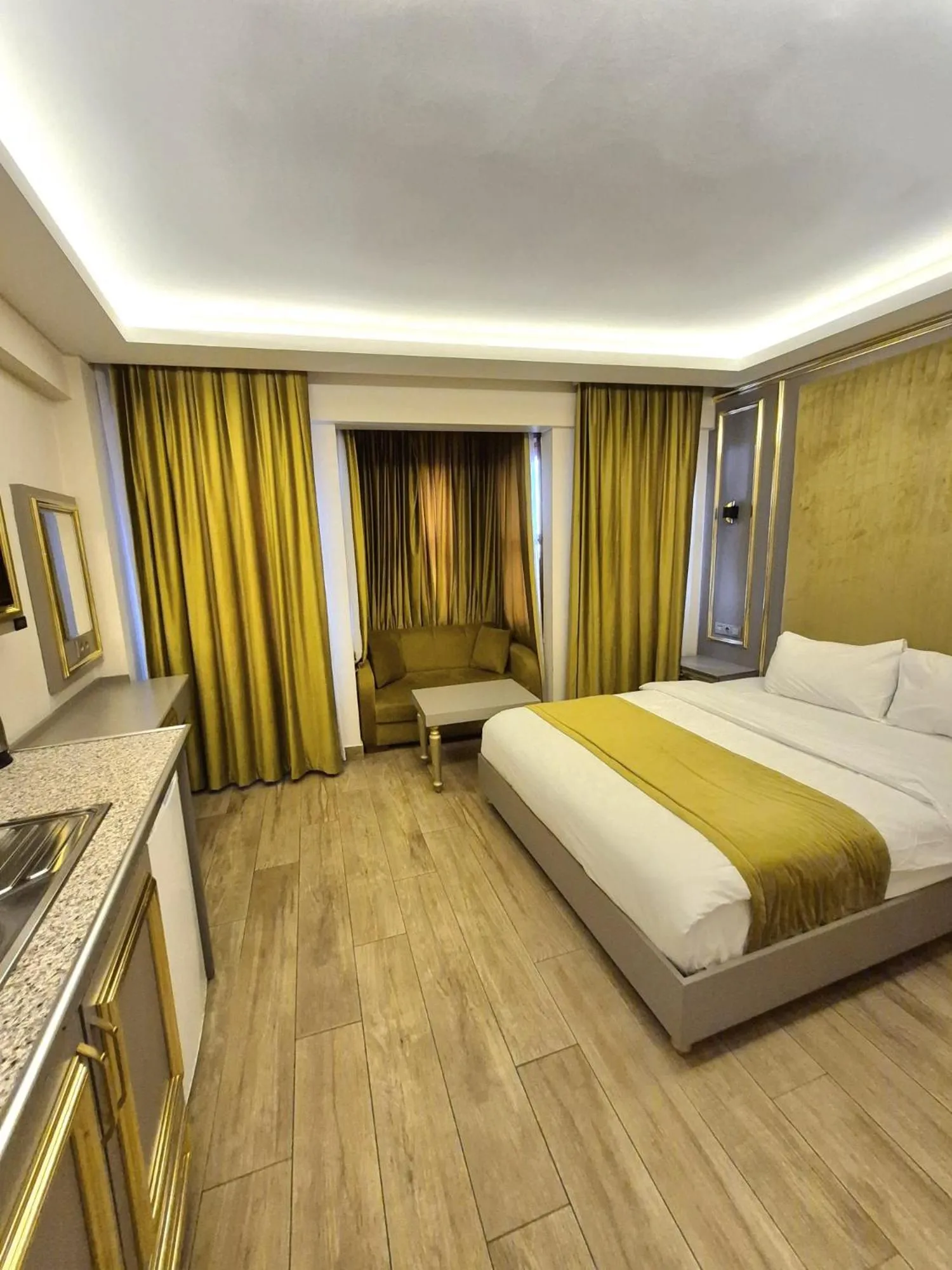 Photo of the whole room, Bed in Taksim La Marino Hotel