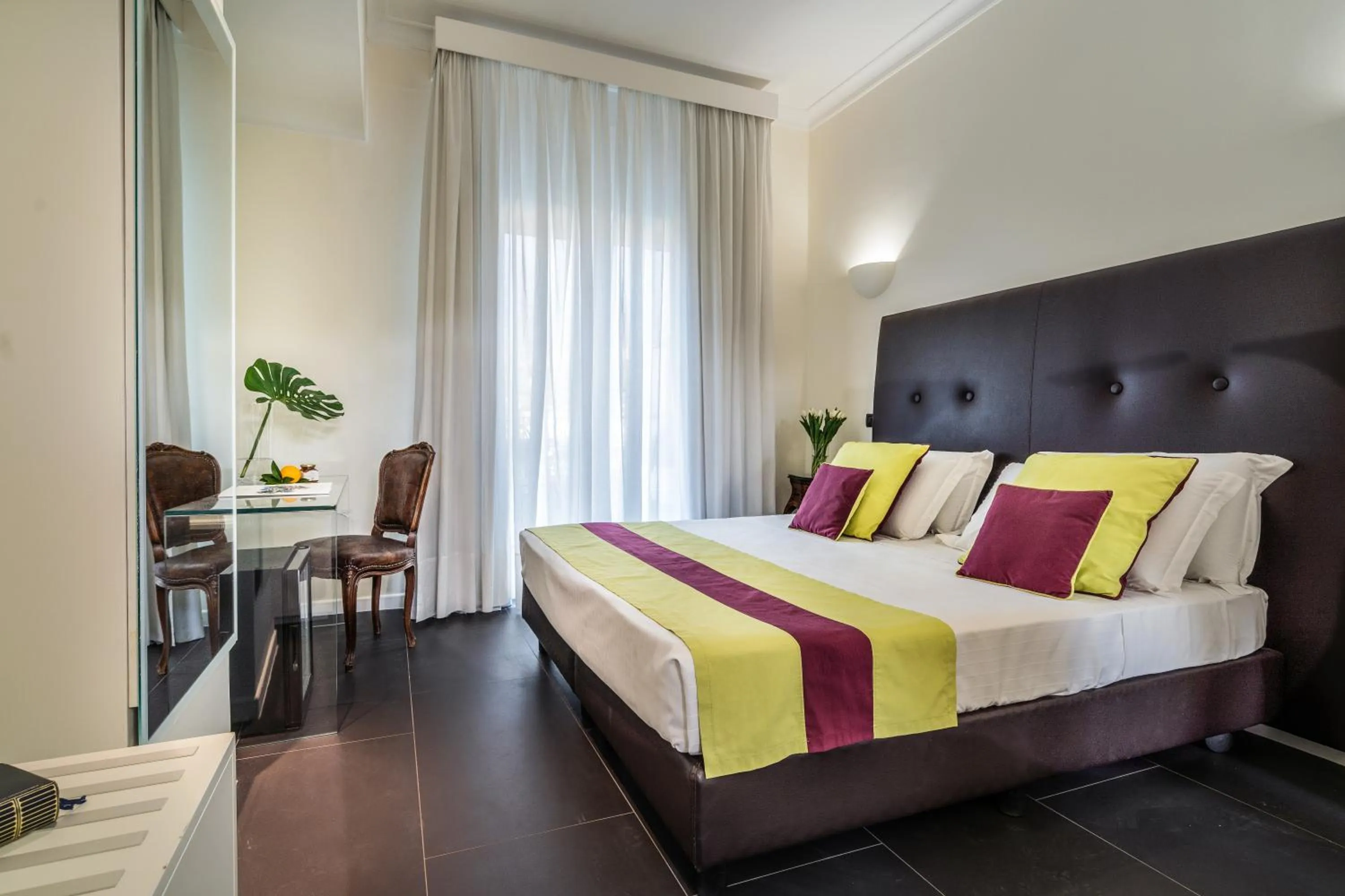 Bed in Majestic Palace Hotel