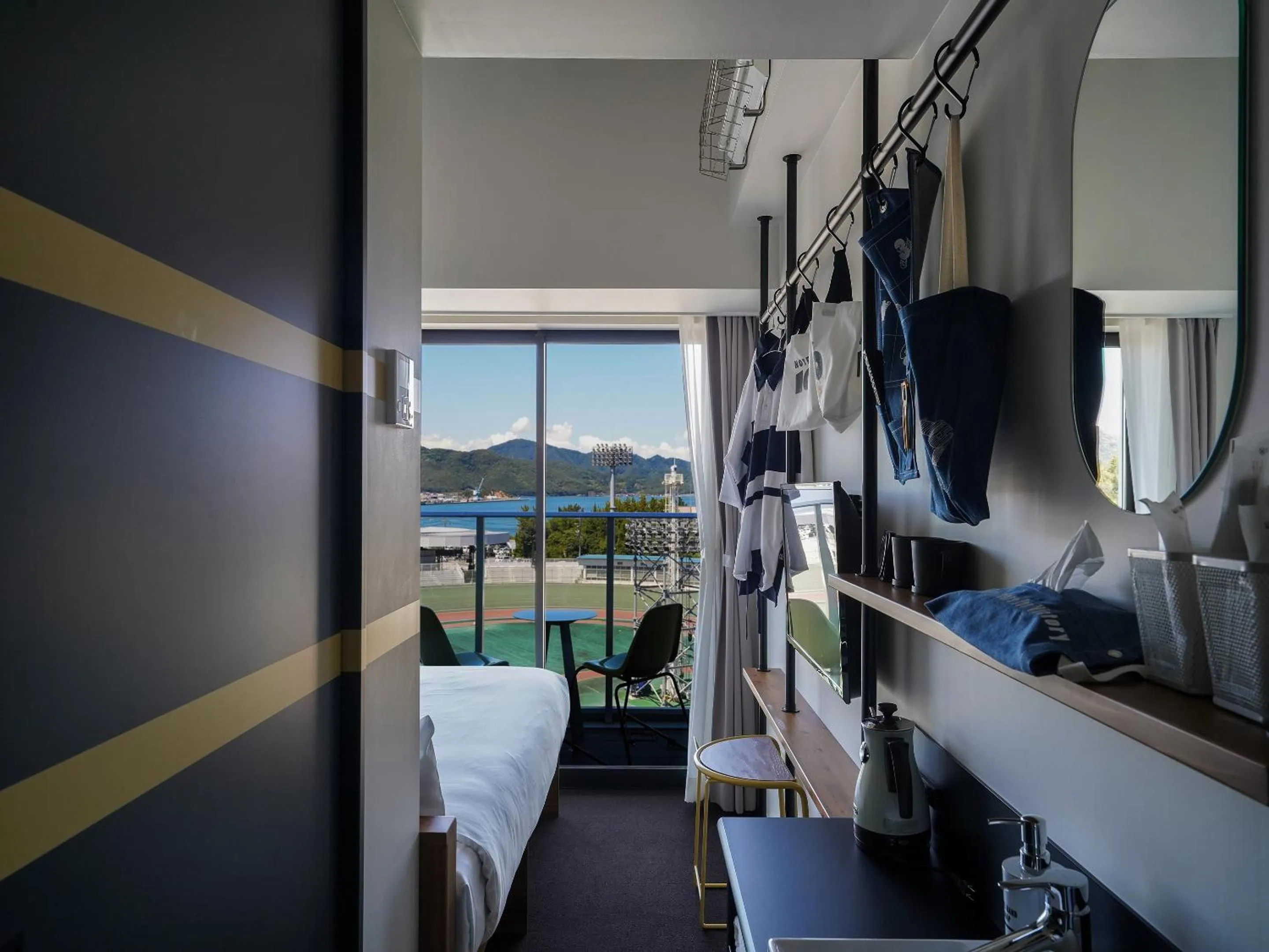 Photo of the whole room, Bed in SETOUCHI KEIRIN HOTEL 10 by Onko Chishin
