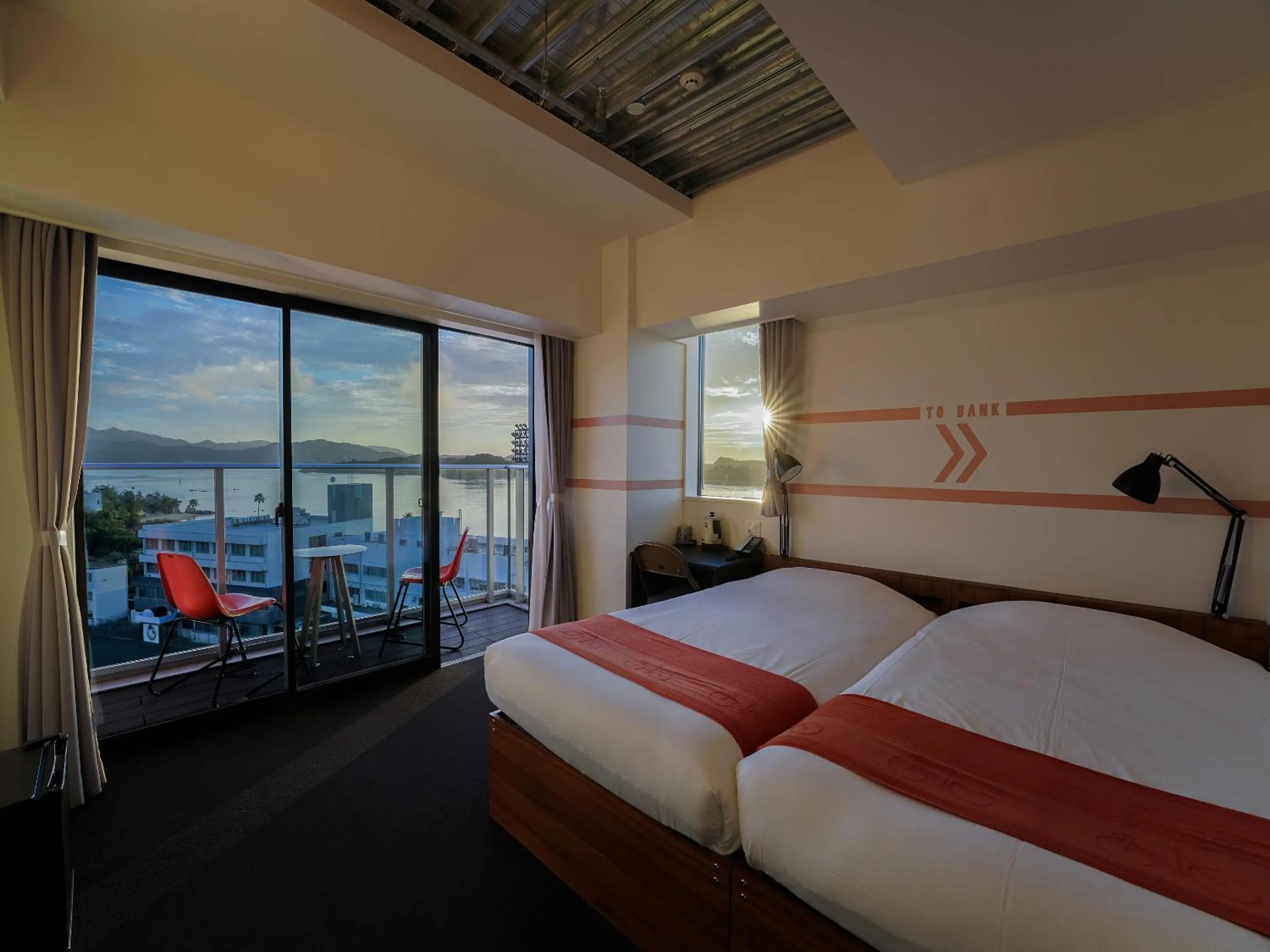 Photo of the whole room, Bed in SETOUCHI KEIRIN HOTEL 10 by Onko Chishin