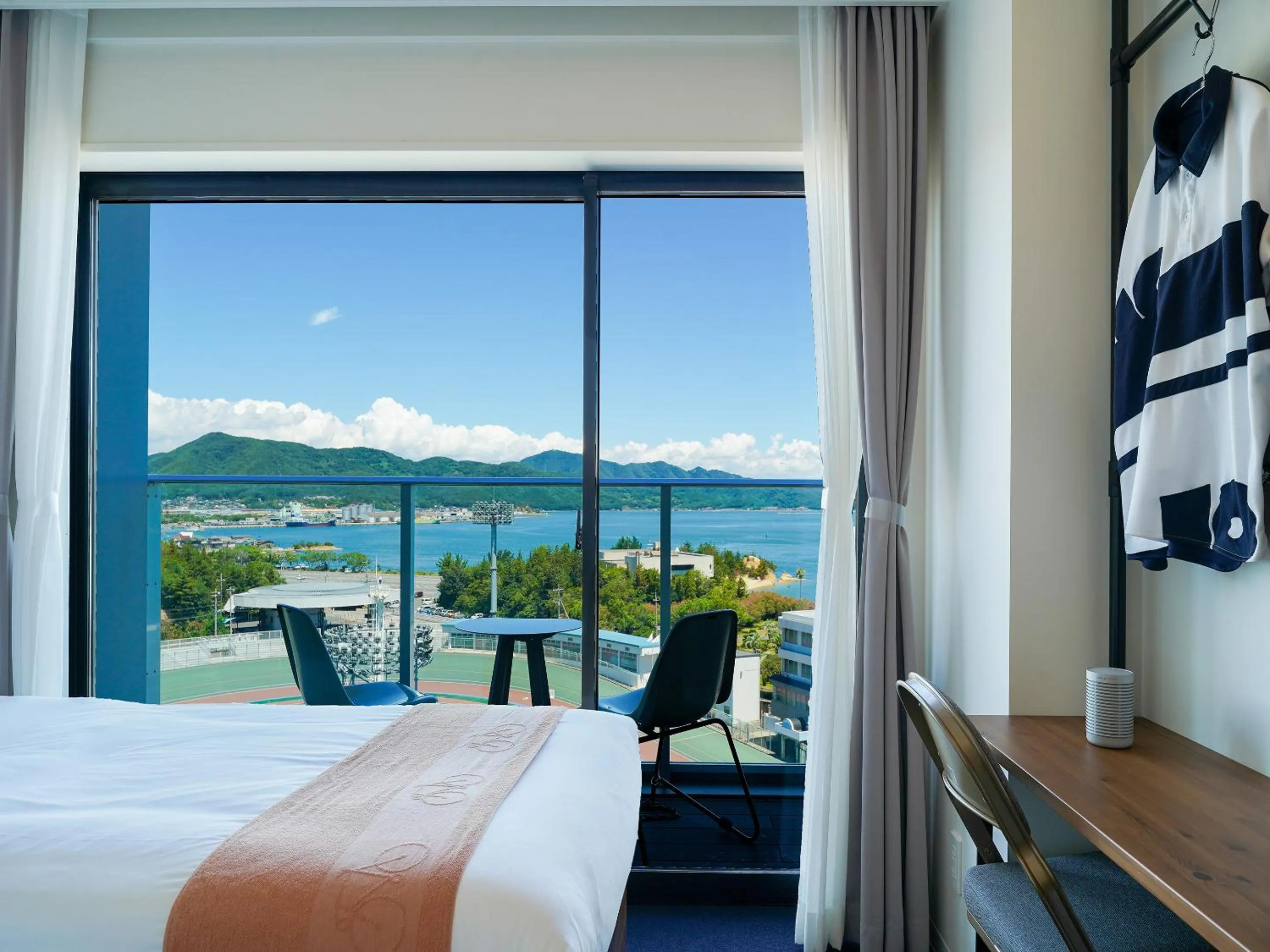 View (from property/room), Bed in SETOUCHI KEIRIN HOTEL 10 by Onko Chishin