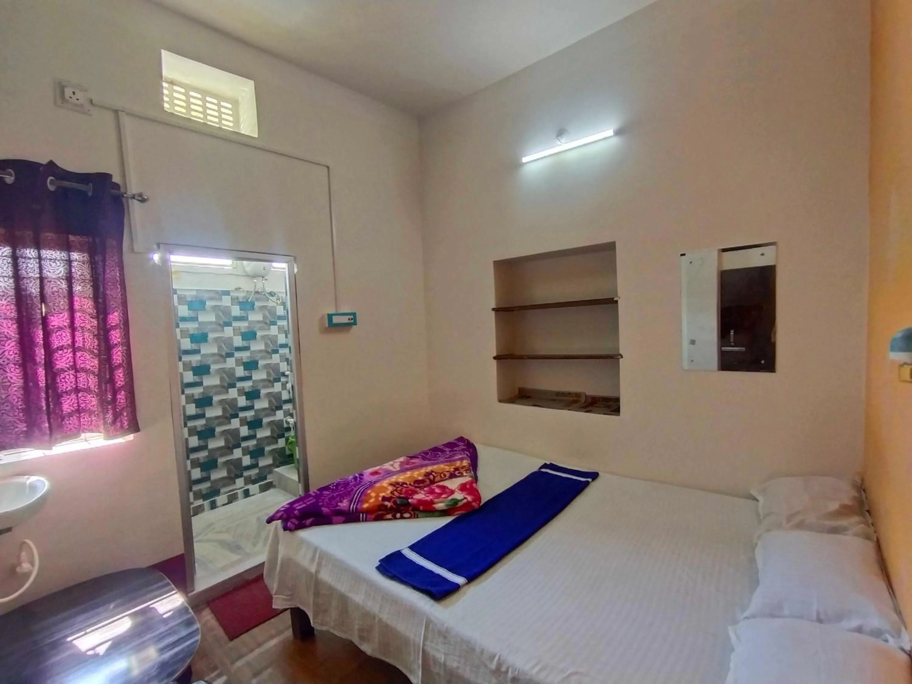 Bedroom in SPOT ON Ganguly Hotel Lodging And Fooding