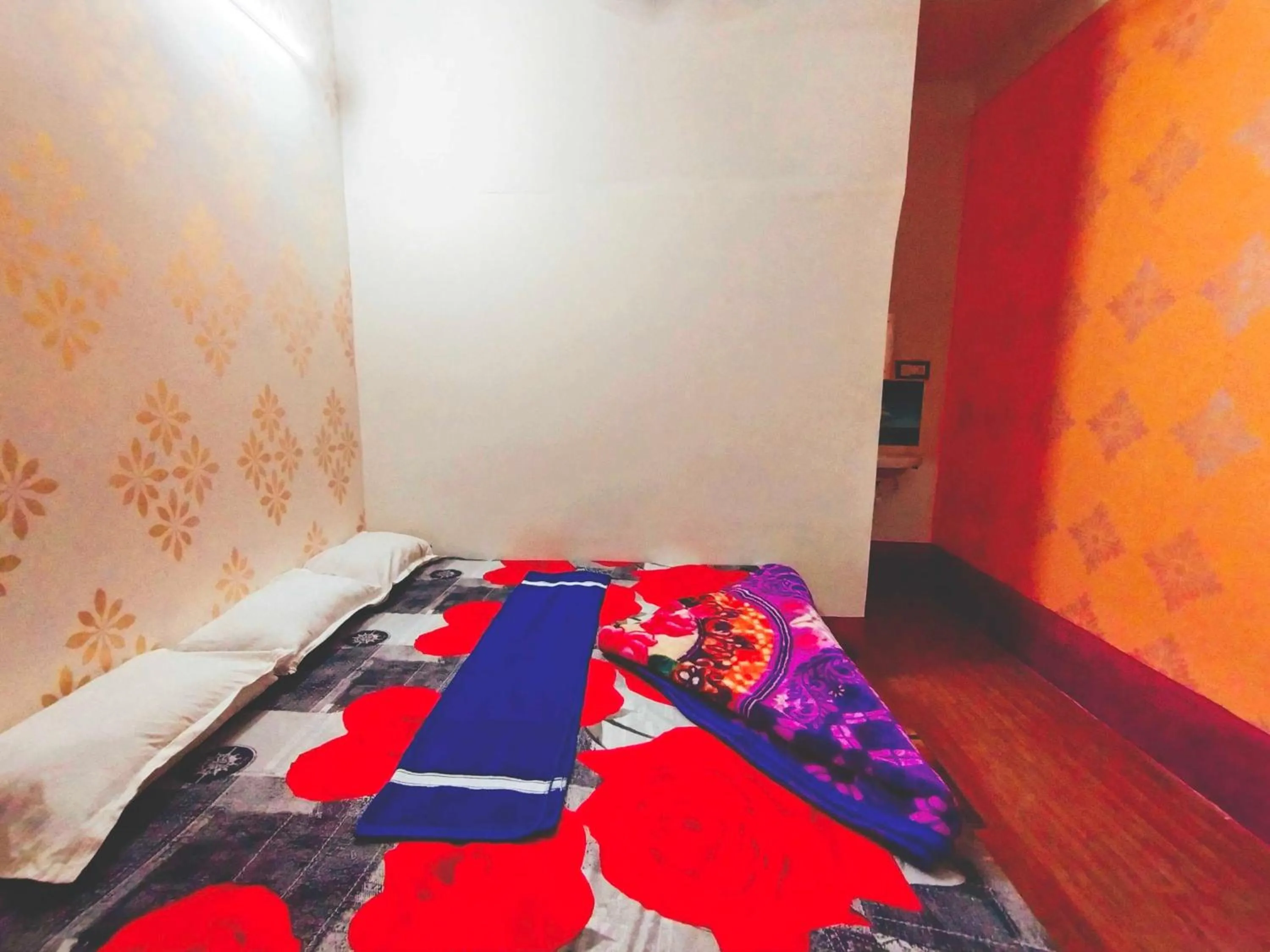 Bedroom in SPOT ON Ganguly Hotel Lodging And Fooding