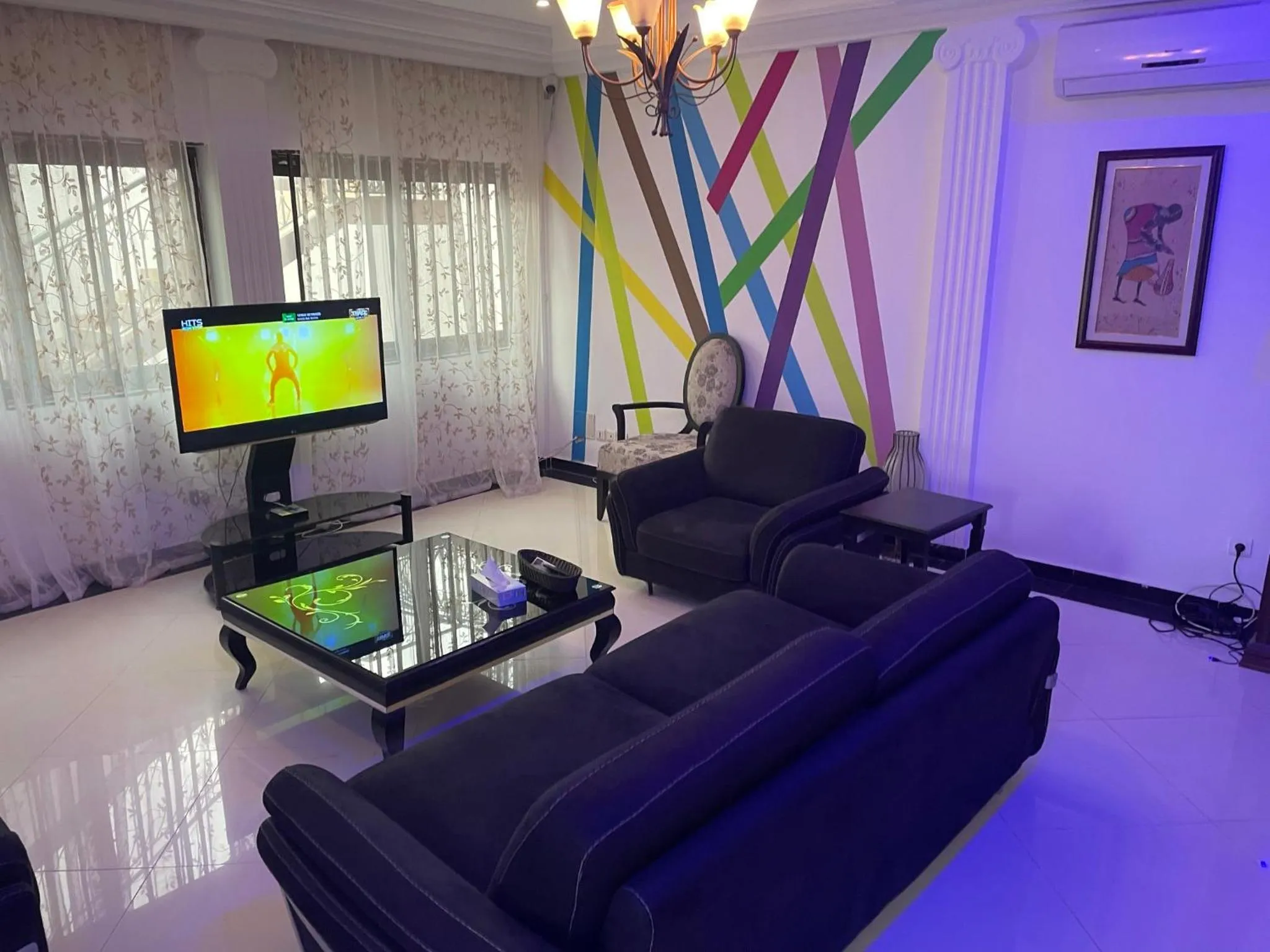 Communal lounge/ TV room in HOTEL LES ARCADES