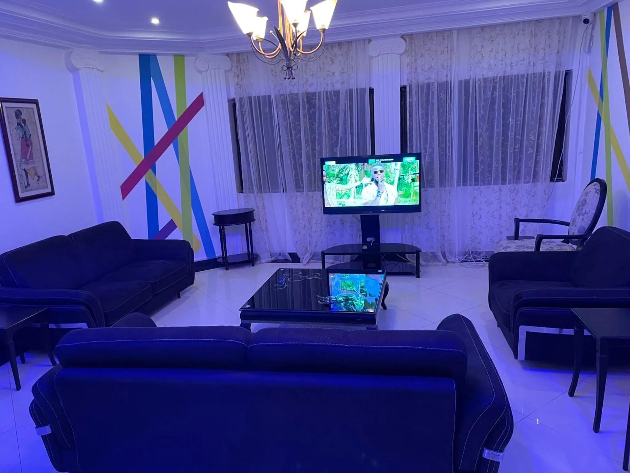 Communal lounge/ TV room in HOTEL LES ARCADES