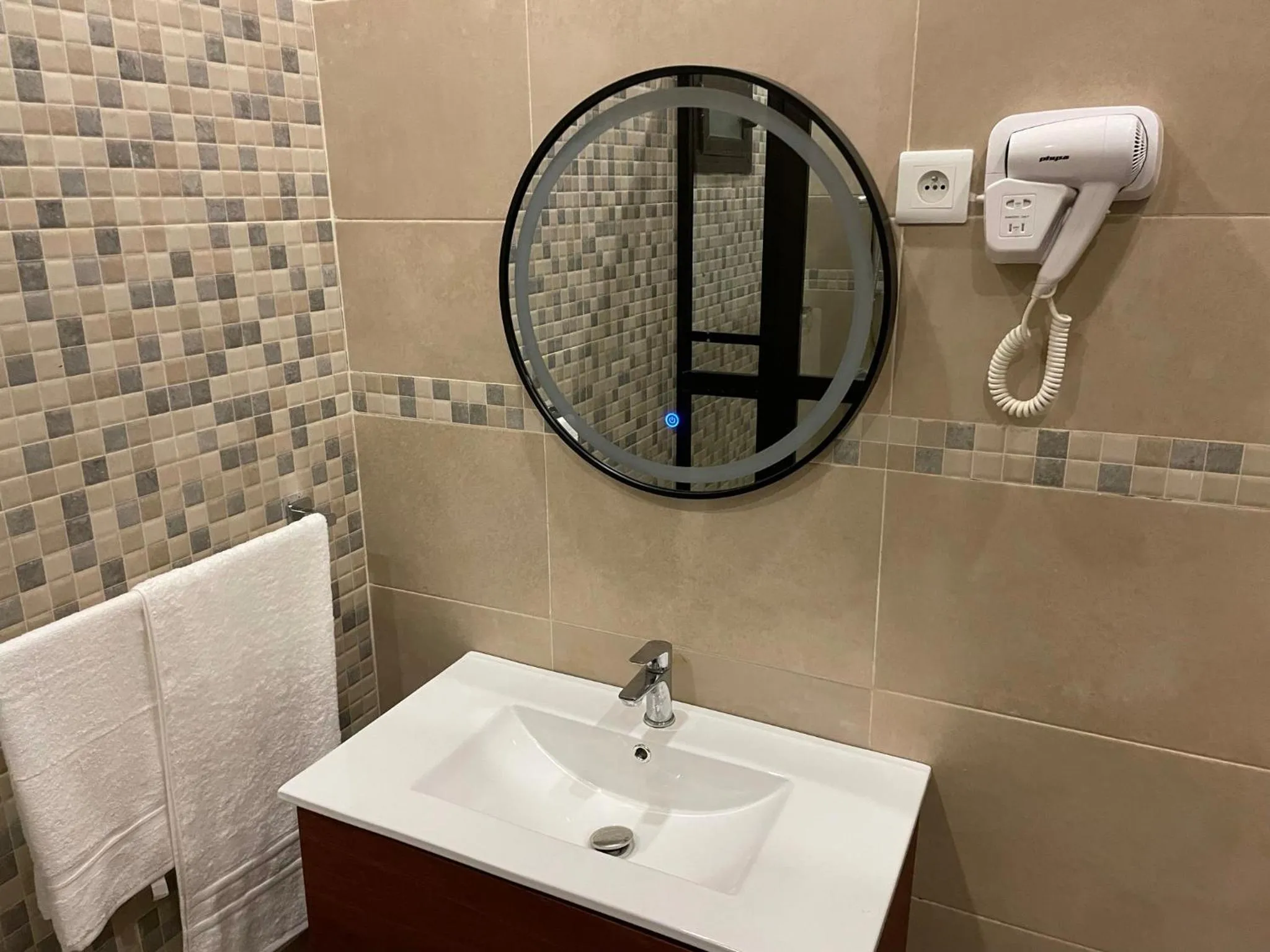 Shower in HOTEL LES ARCADES