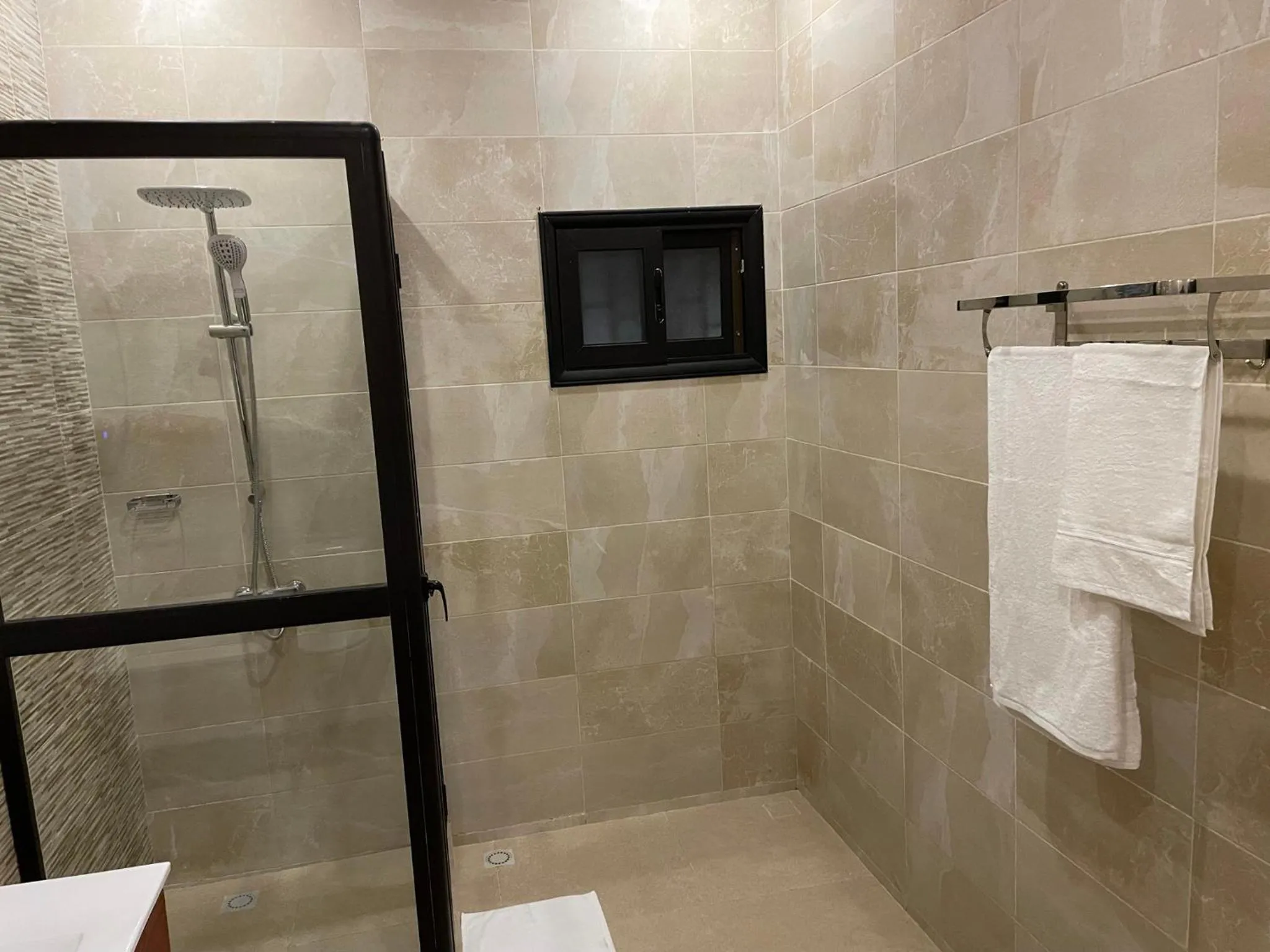 Shower in HOTEL LES ARCADES