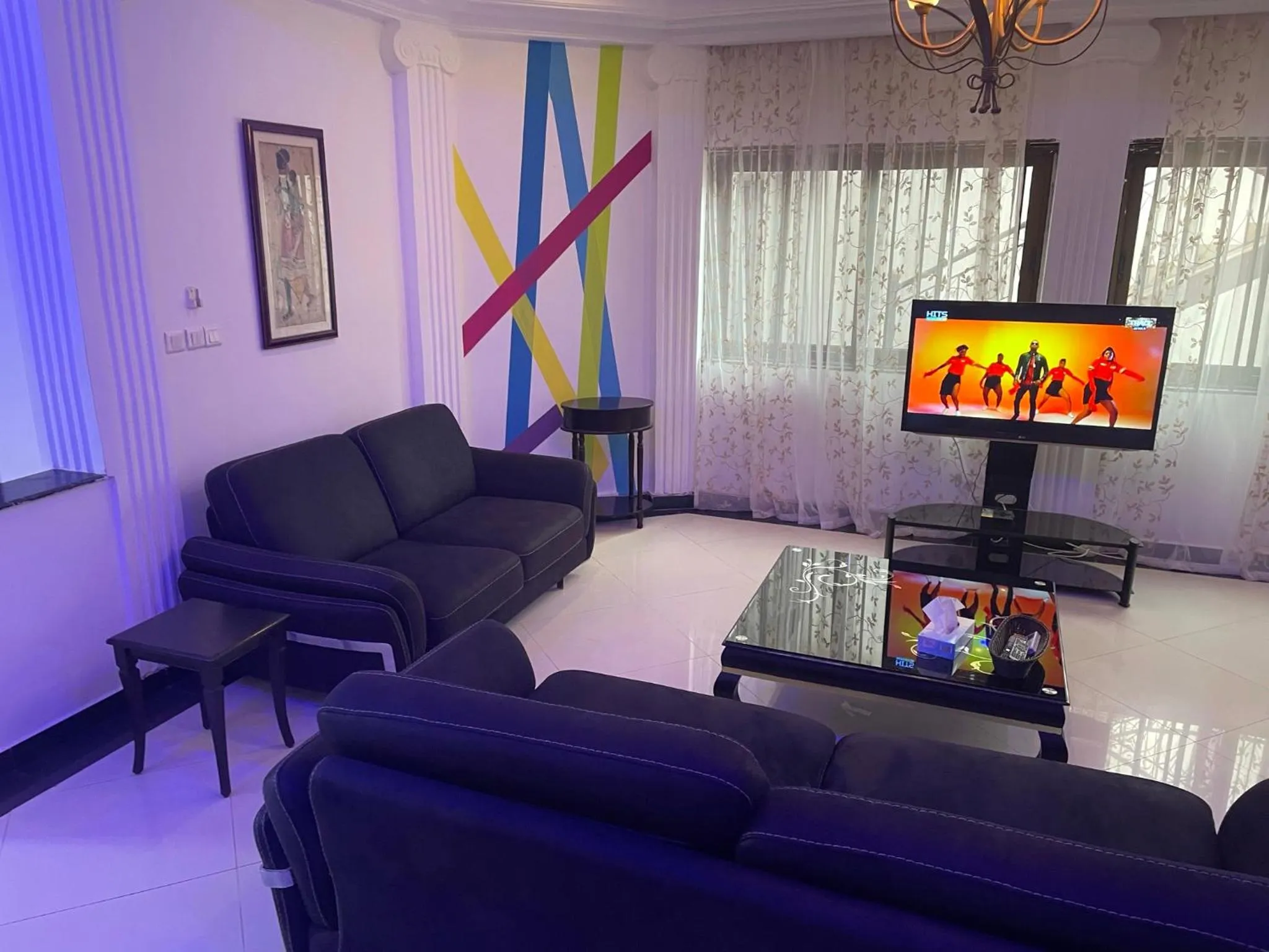 Communal lounge/ TV room in HOTEL LES ARCADES