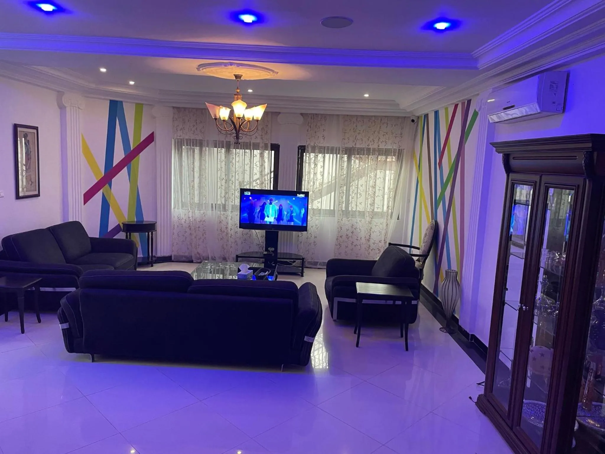 Communal lounge/ TV room in HOTEL LES ARCADES