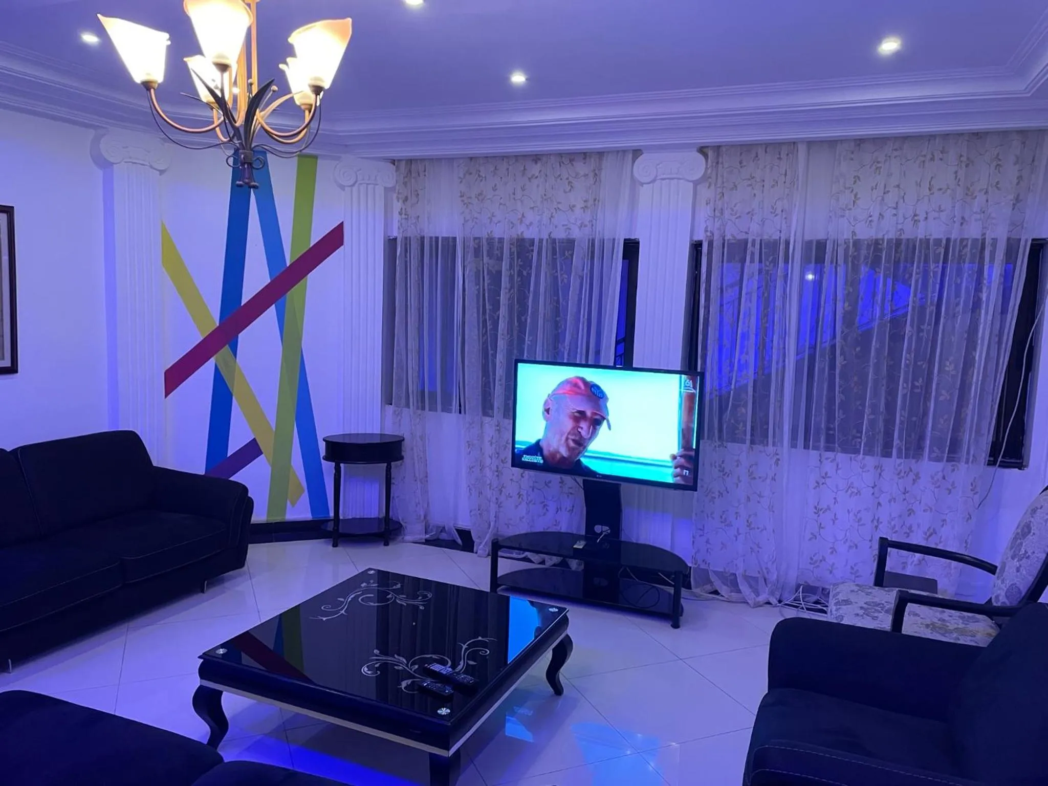 Communal lounge/ TV room in HOTEL LES ARCADES