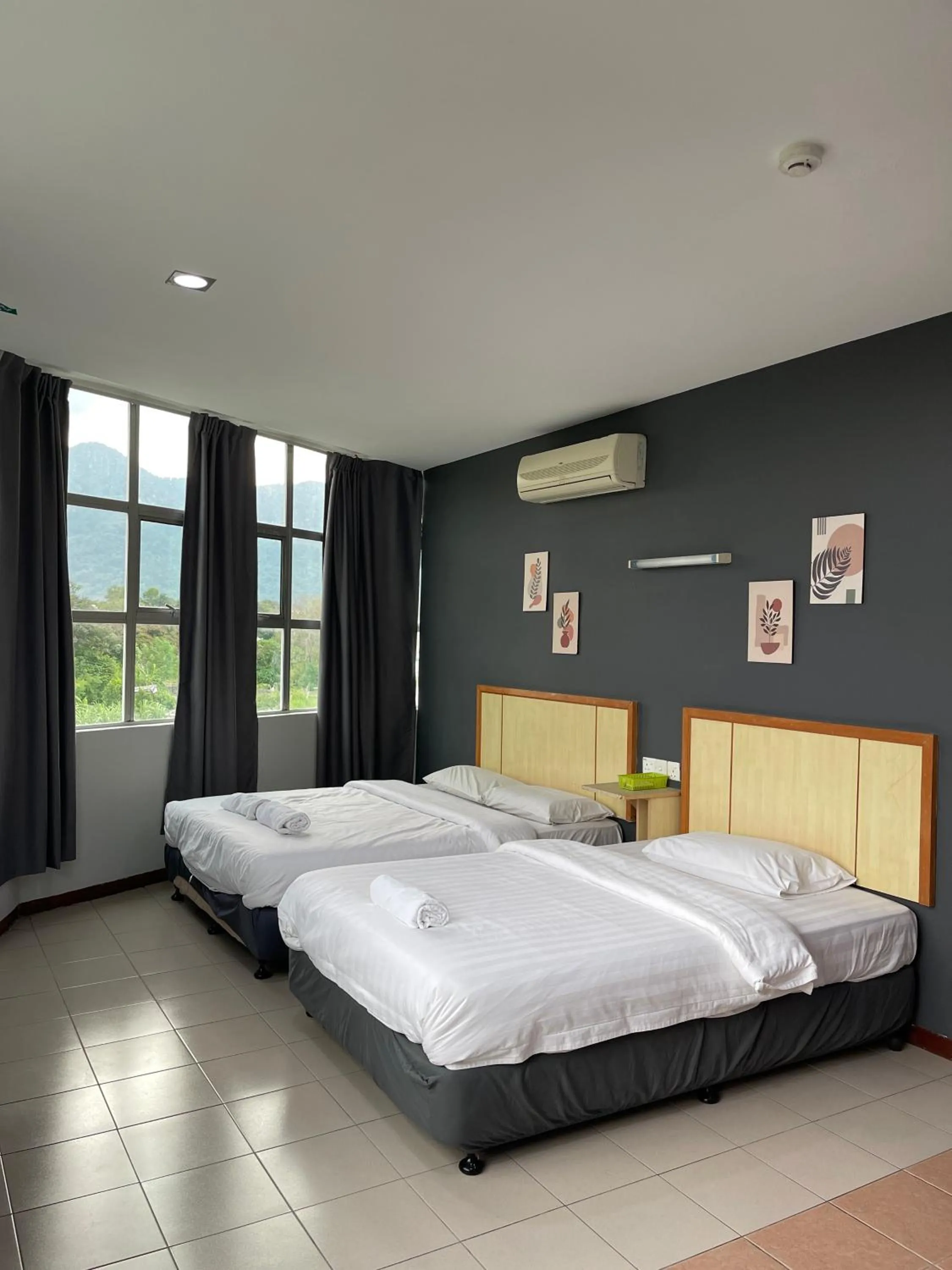 Bed in Fresh Hotel Falim