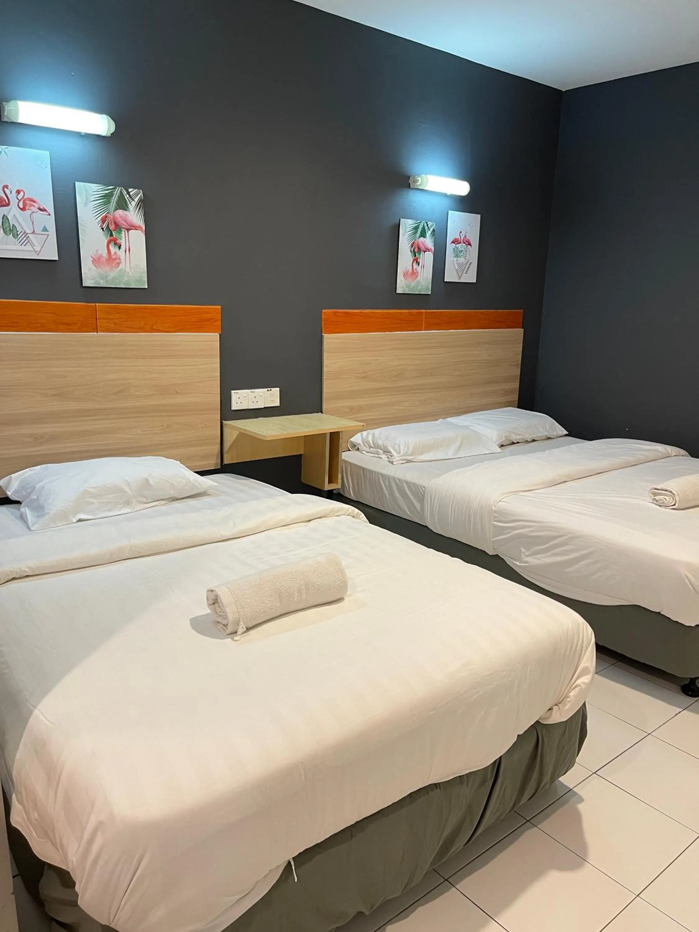 Bed in Fresh Hotel Falim