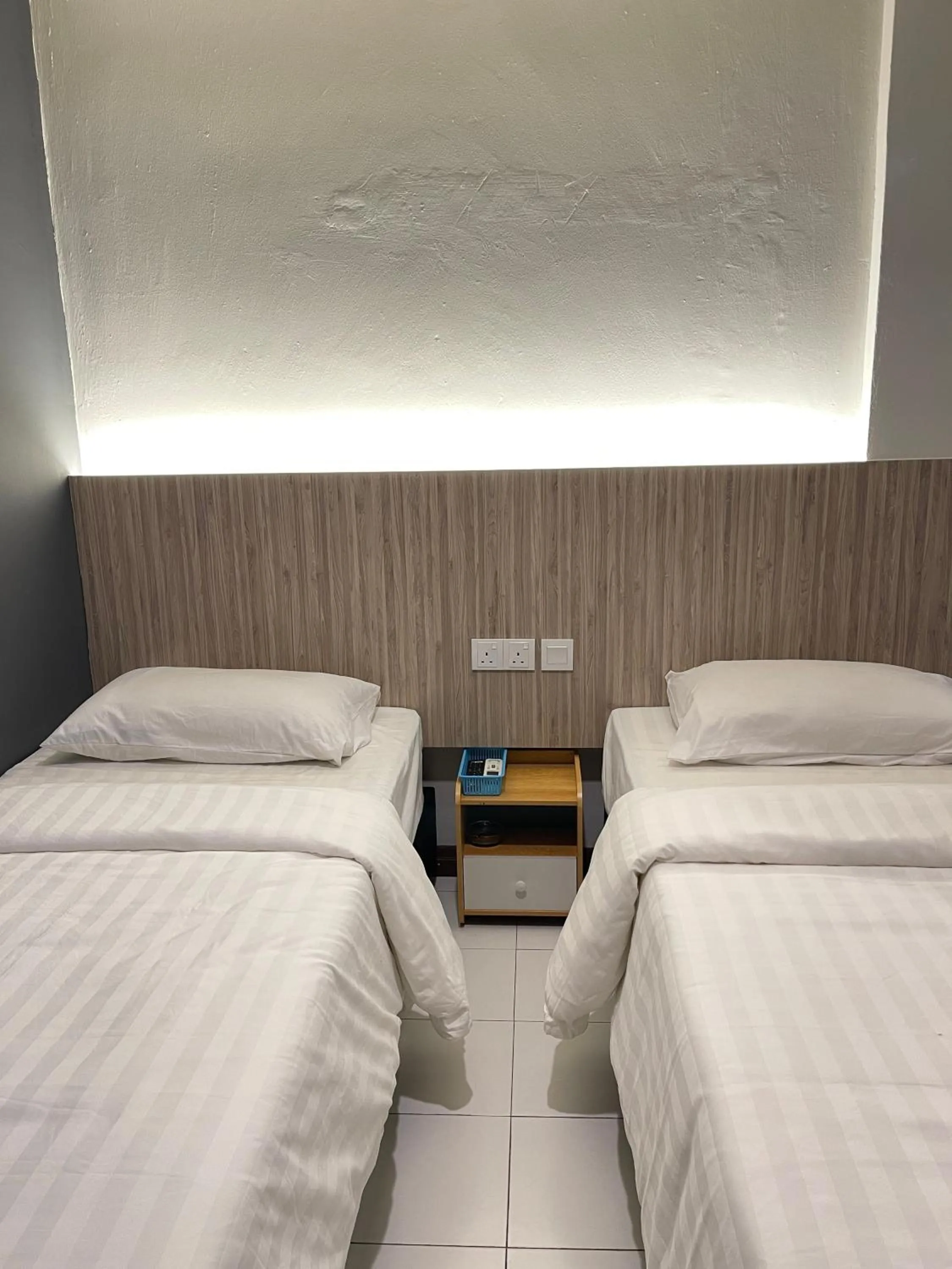 Bed in Fresh Hotel Falim