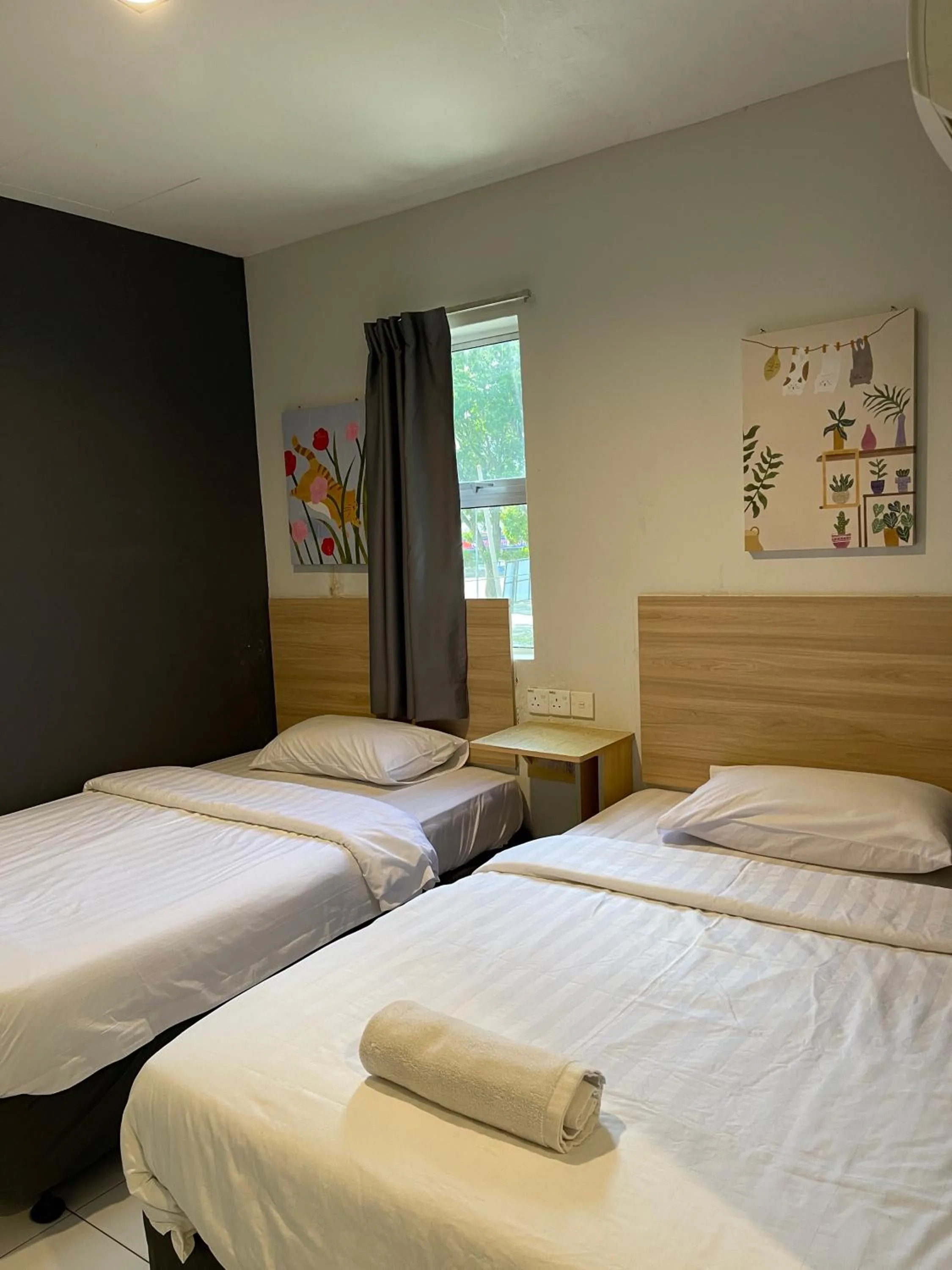 Bed in Fresh Hotel Falim