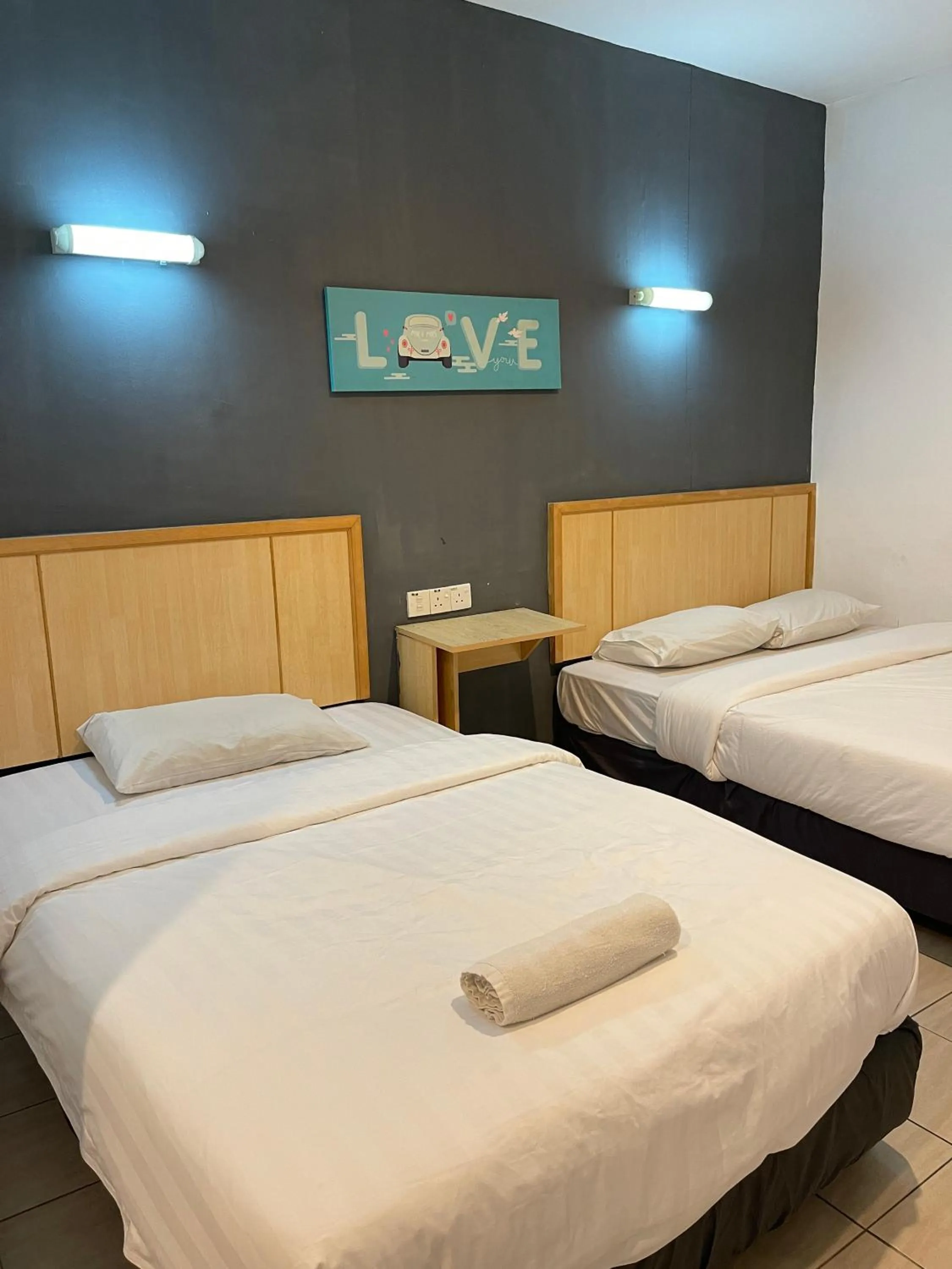 Bed in Fresh Hotel Falim