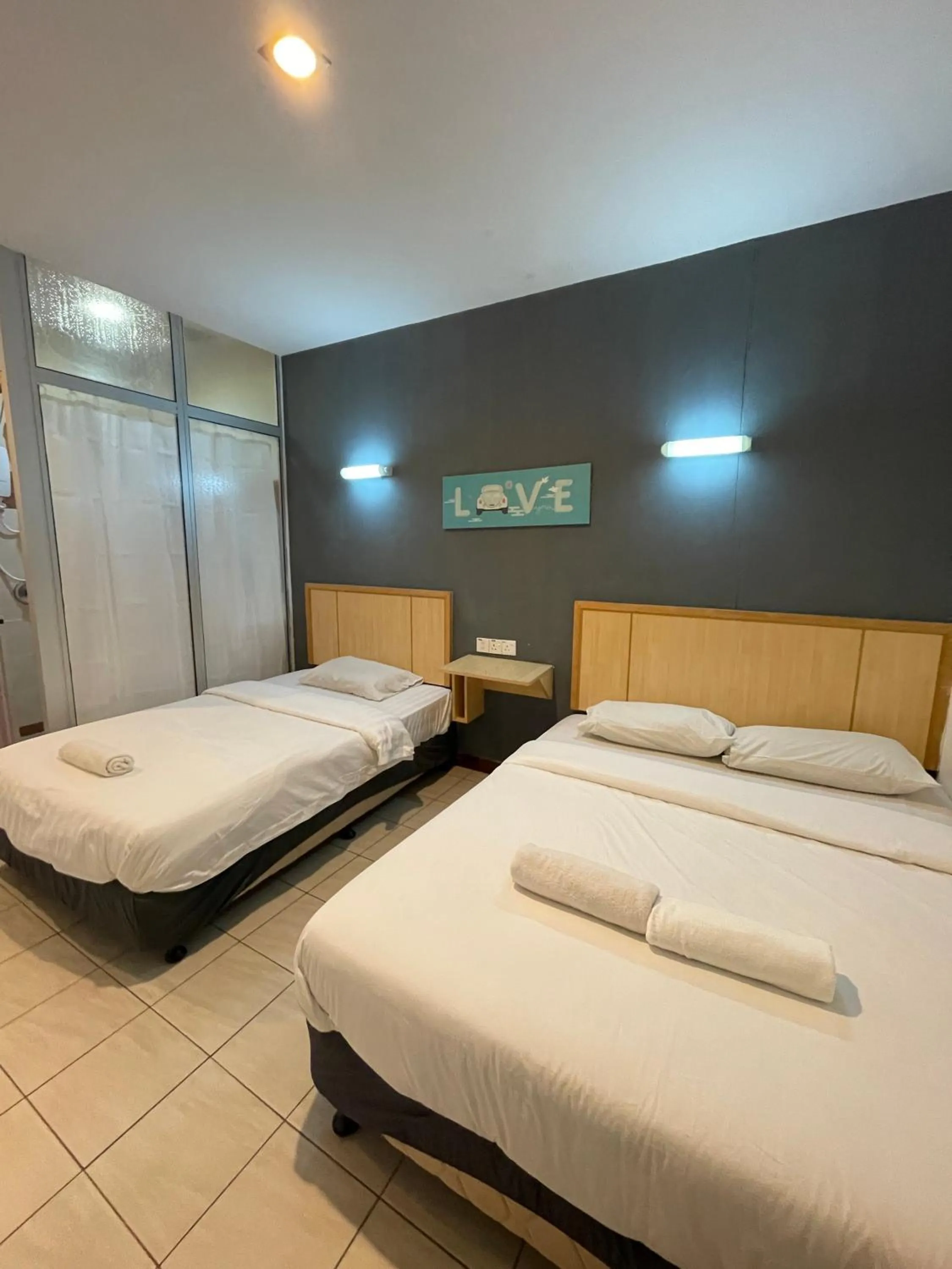 Bed in Fresh Hotel Falim