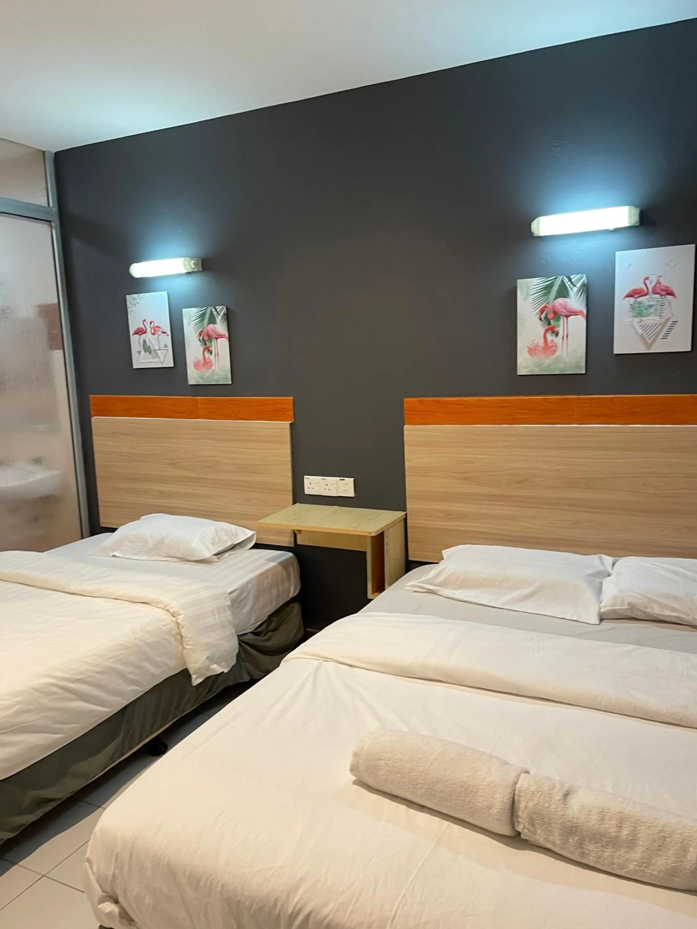 Bed in Fresh Hotel Falim