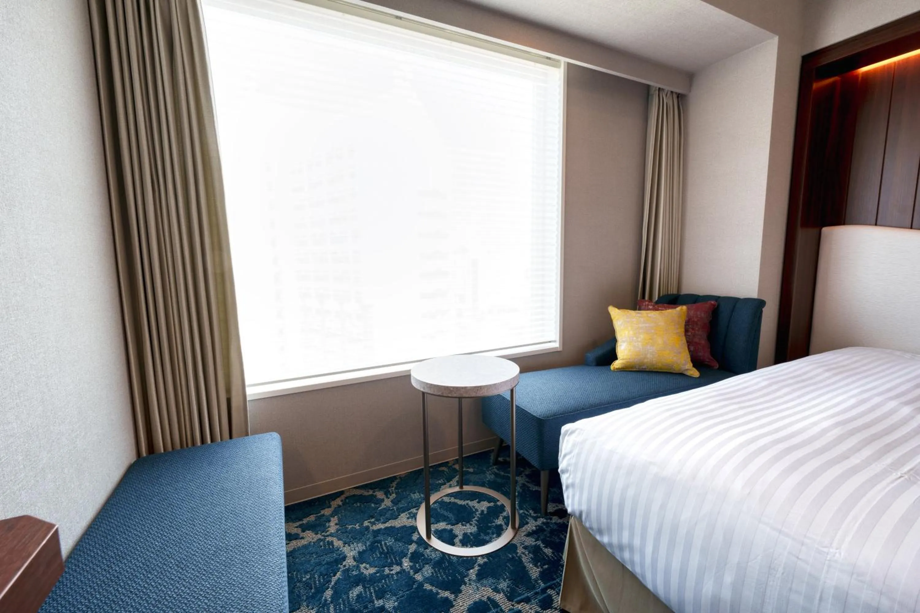 Photo of the whole room, Bed in Hotel GrandConsort Naha