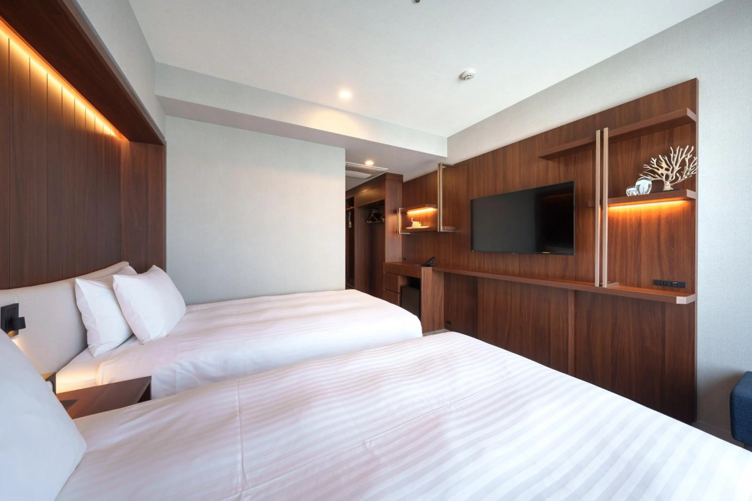 Bed in Hotel GrandConsort Naha