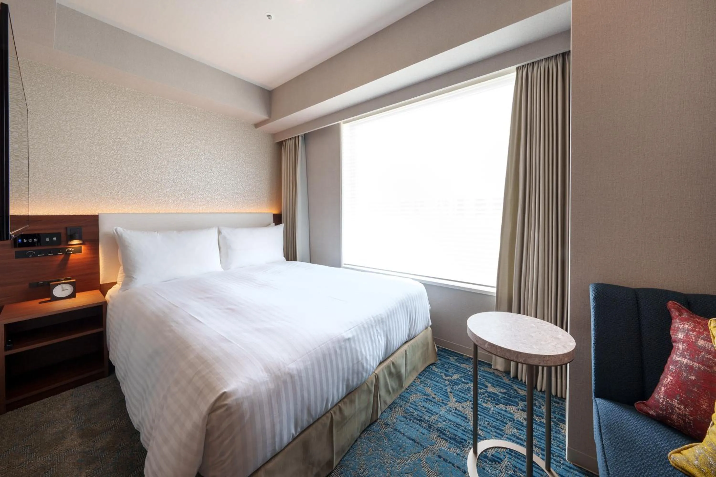 Bed in Hotel GrandConsort Naha