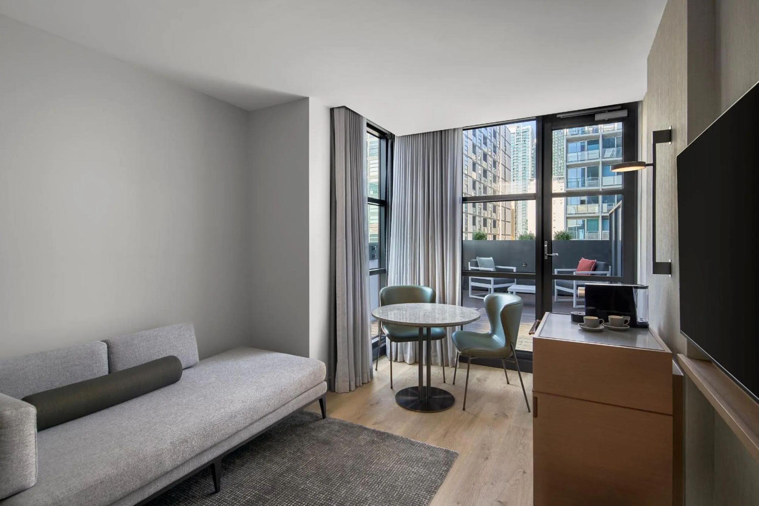 Living room in Courtyard by Marriott Melbourne Flagstaff Gardens