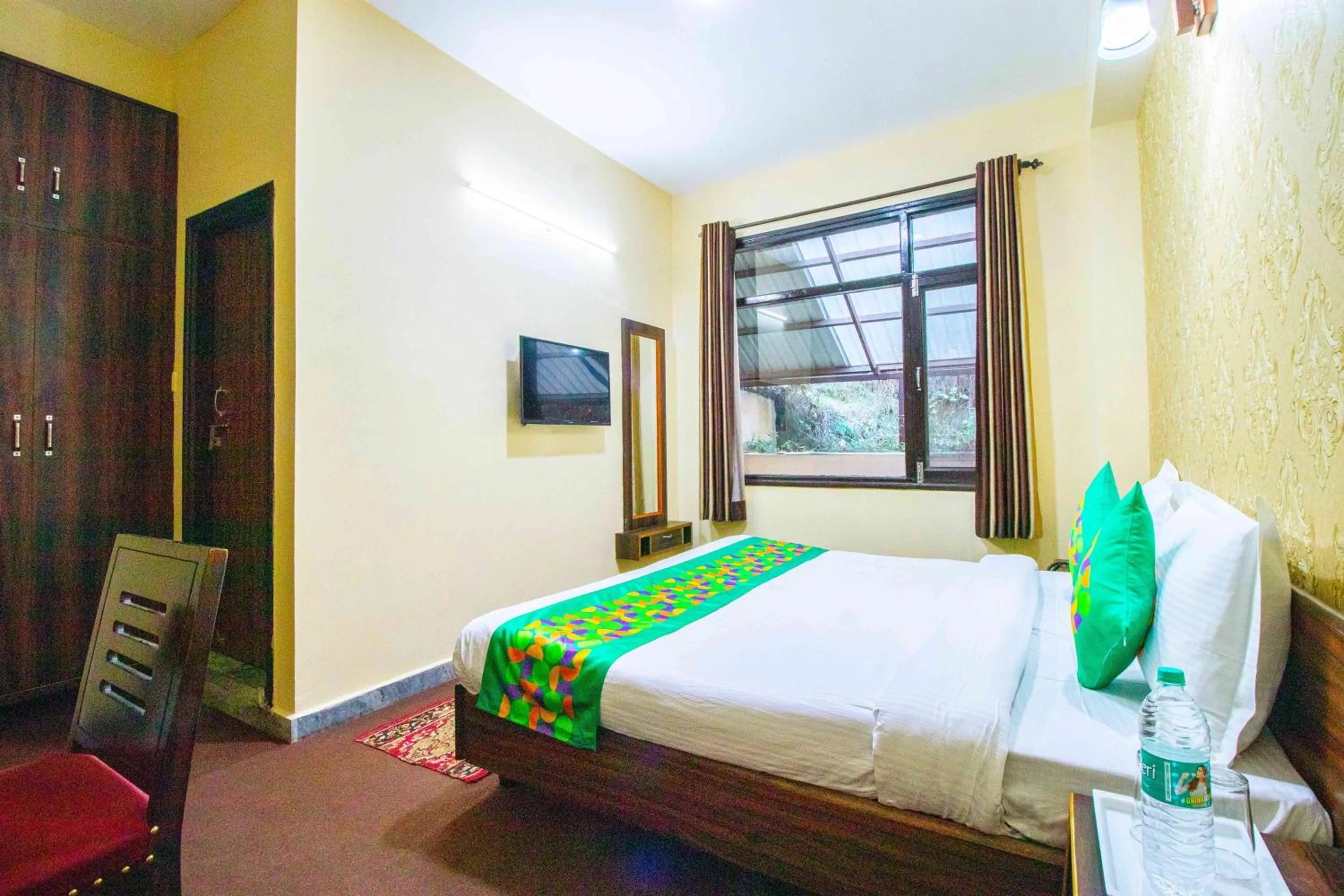 Bedroom, Bed in Treebo Shimla Ayurvedic Retreat, Kufri - Pure Veg