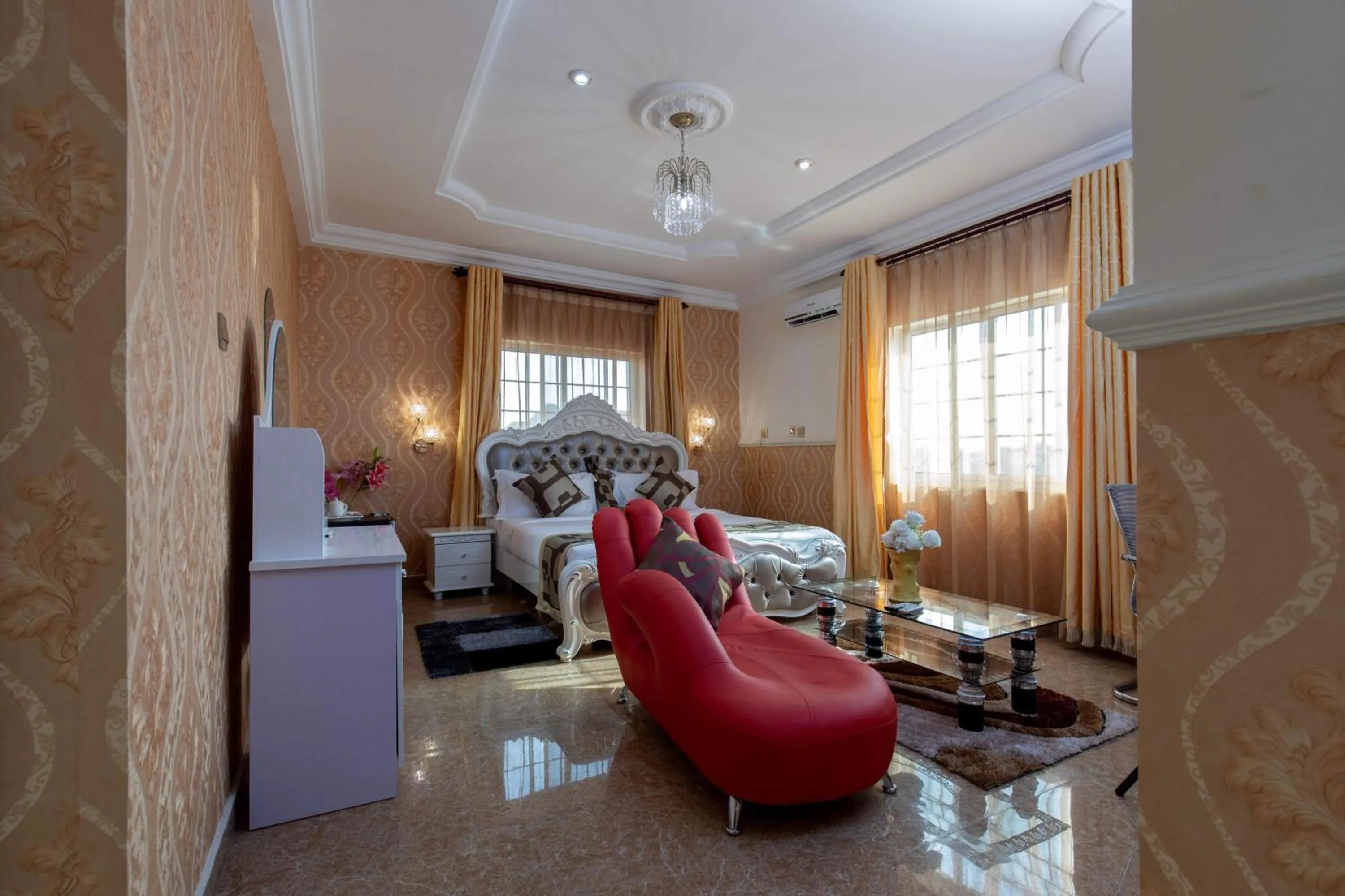 Bedroom in Amazing Grace Hotel & Suites