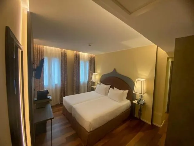 Bed in Albergo San Marco