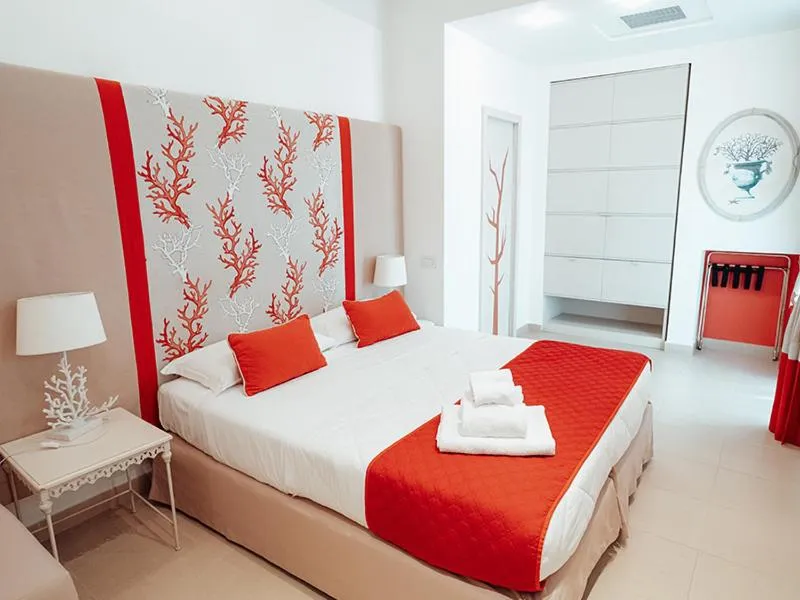 Bed in Hotel Corallo Sorrento