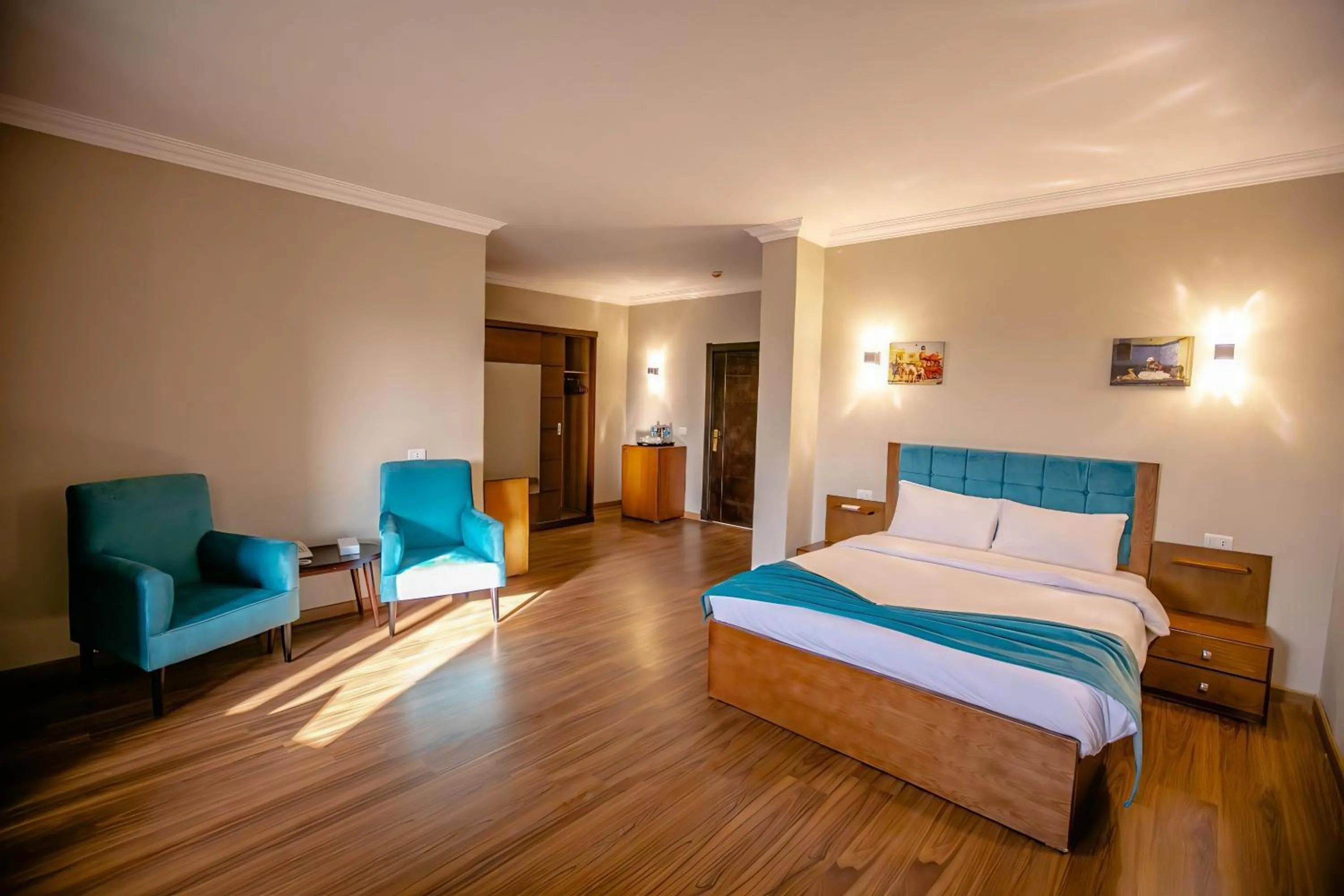 Bed in Pyramids Oasis Hotel